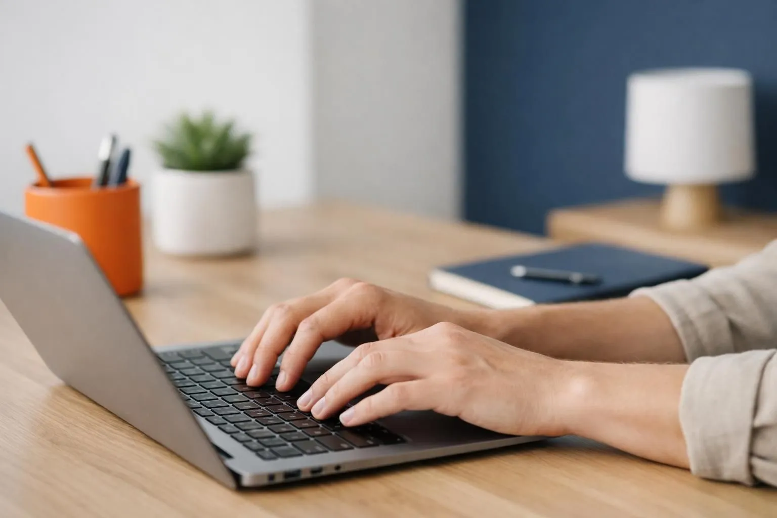 Close-up of hands typing on laptop with holographic API connection nodes and flowing text streams emanating from screen, representing real-time content generation workflow in modern office setting