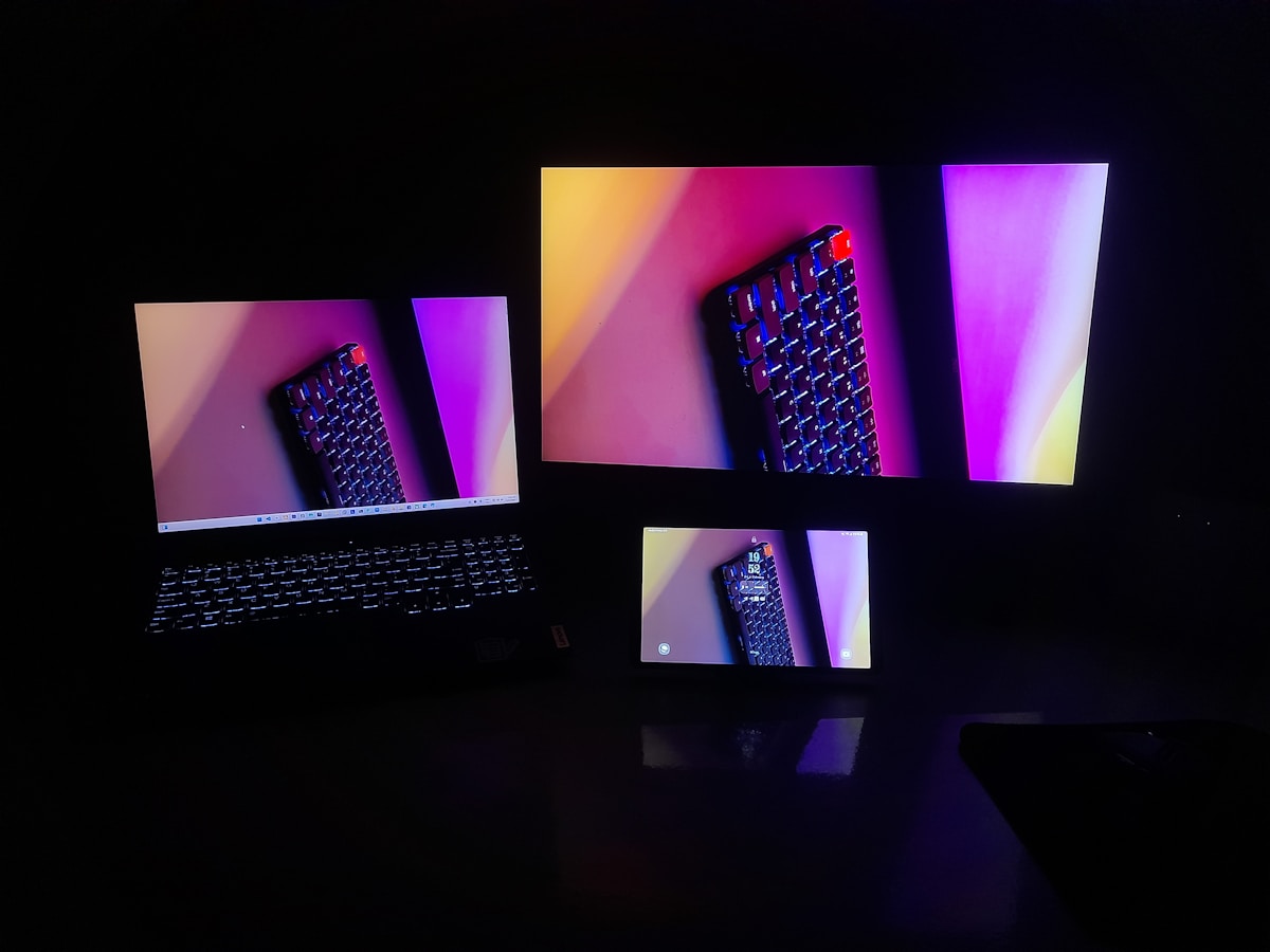 A laptop computer sitting on top of a desk