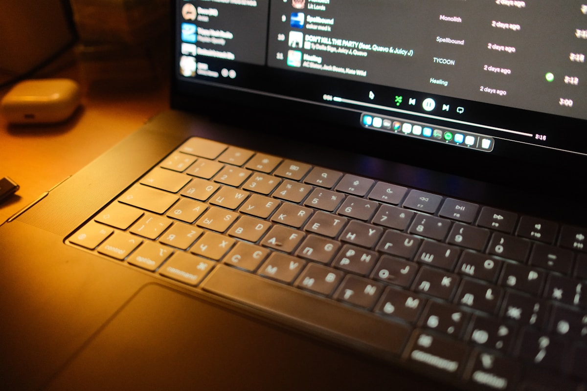 Laptop keyboard illuminated with warm light