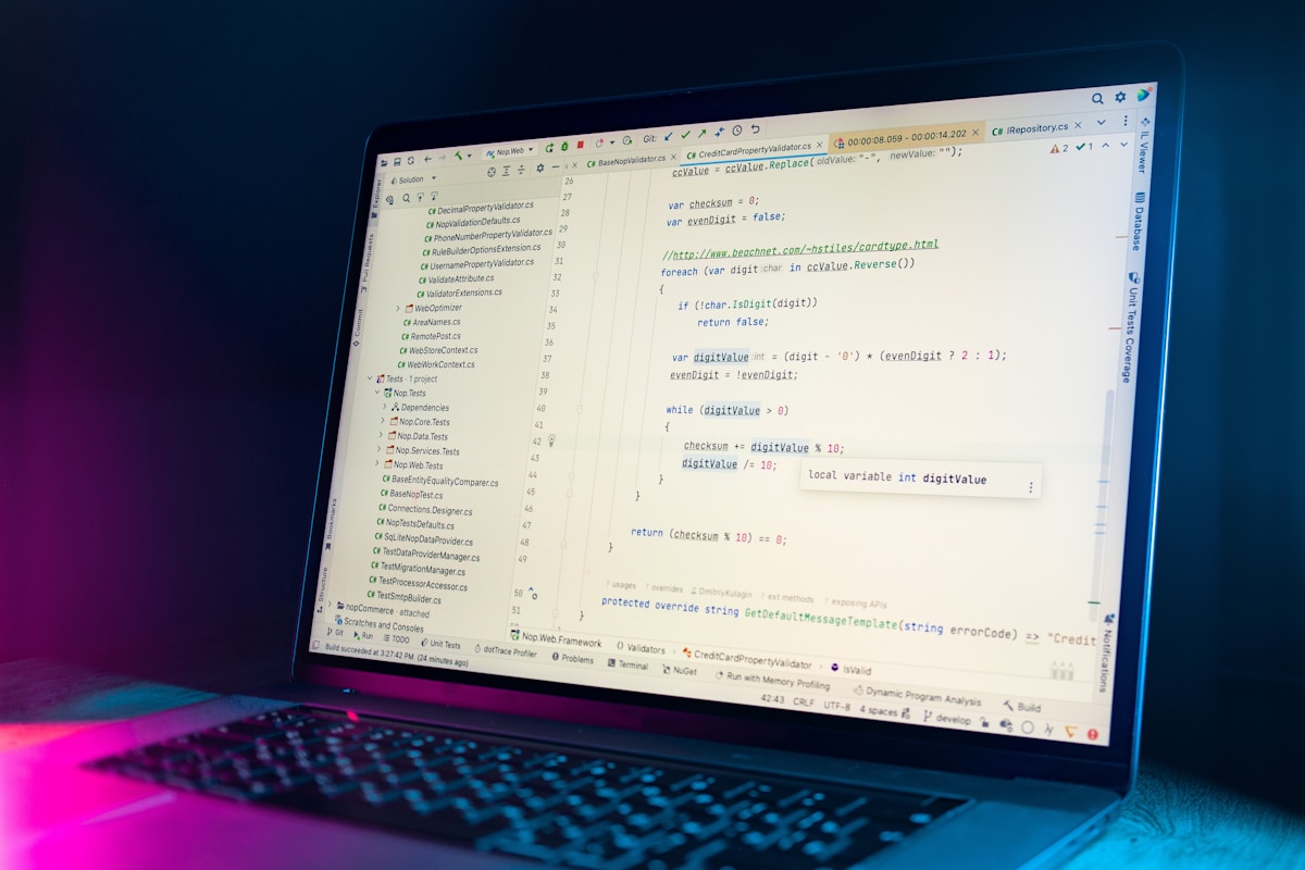 Laptop screen displaying lines of code
