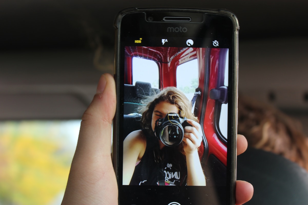woman using camera photo
