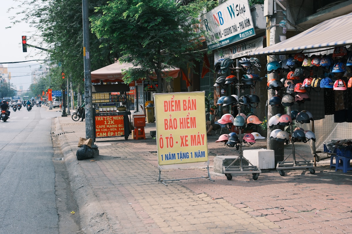 A street scene with a store and a motorcycle