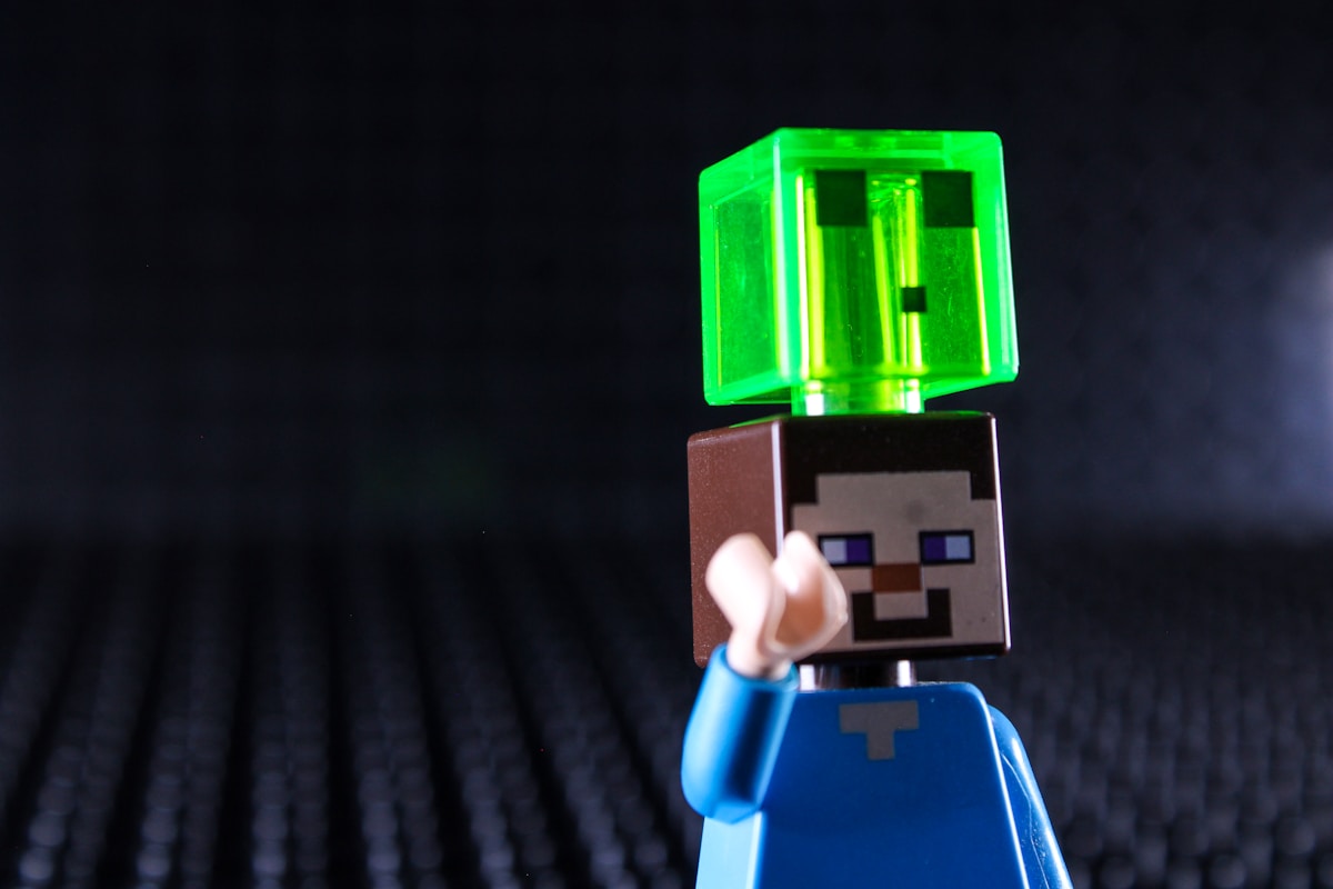 Lego steve with a green slime block on head
