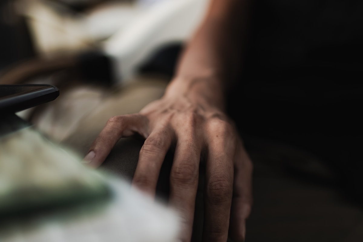 A close up of a person holding a cell phone