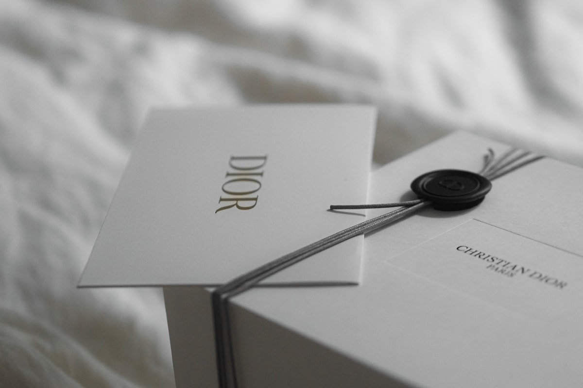 Dior gift box with wax seal and ribbon