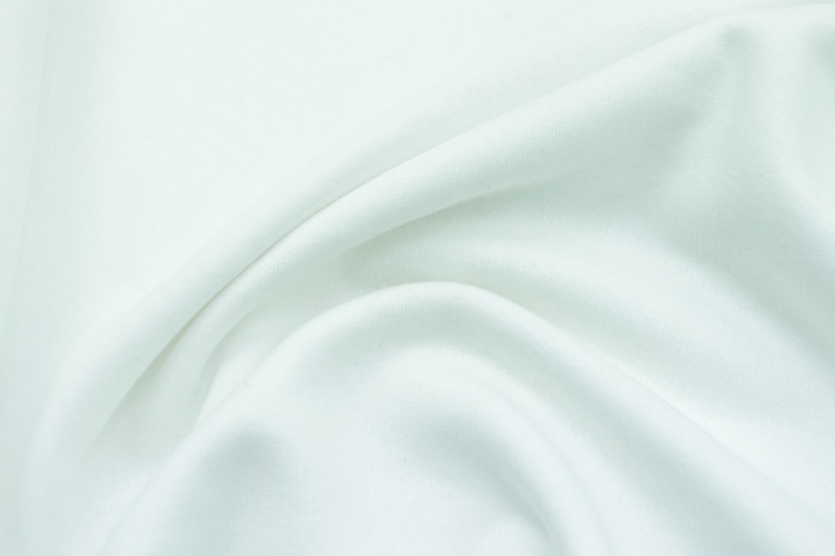 a close up view of a white fabric