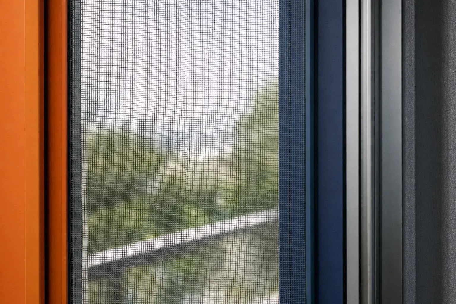 Close-up of high-quality fiberglass mosquito screen mesh installed on modern Swiss window frame with natural daylight filtering through the fine weave, showing clear transparency and air ventilation
