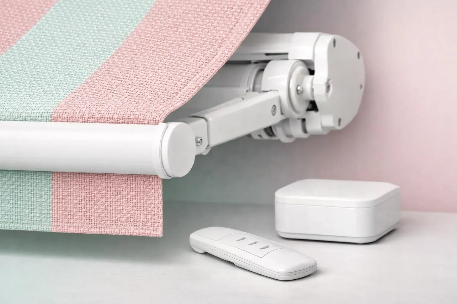 Close-up photo showing high-quality awning fabric texture with visible weave pattern alongside modern motorized mechanism components and control unit on a clean neutral background, no text or labels