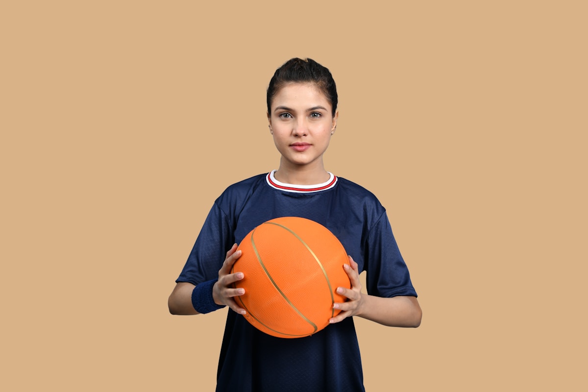 a person holding a ball