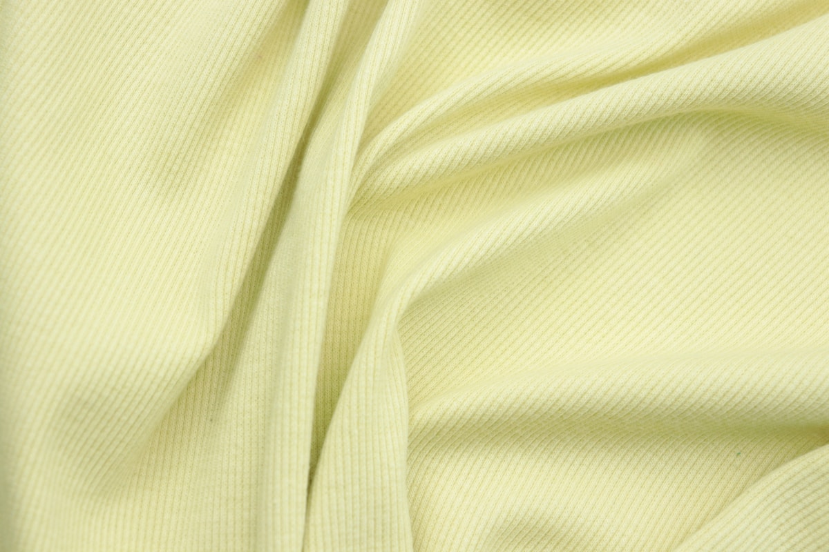 a close up view of a yellow fabric