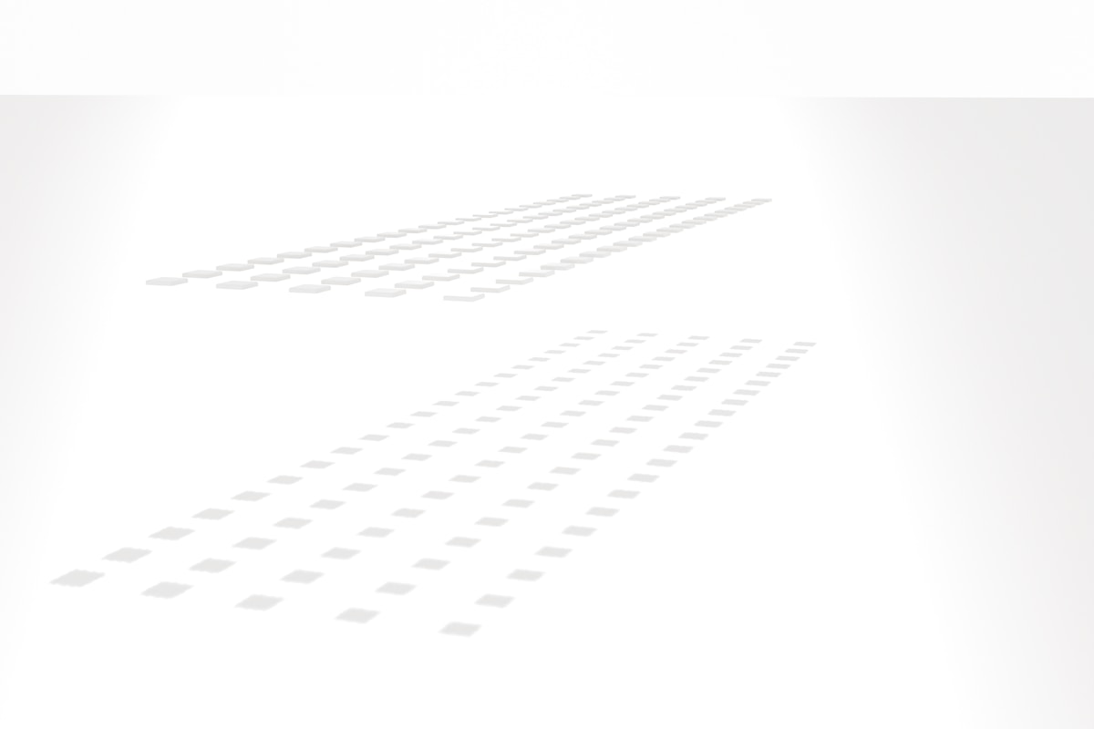 A white background with a lot of dots on it