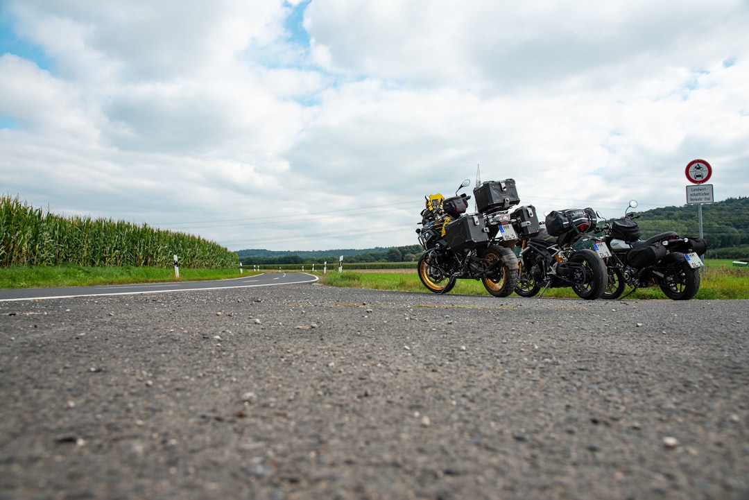 sw-motech - two motorcycles parked on the side of the road