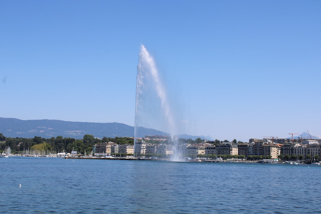 View over the city of Geneva from a high vantage point, showing the blend of tradition and modernity. Photo by Anthony DELANOIX on Unsplash.