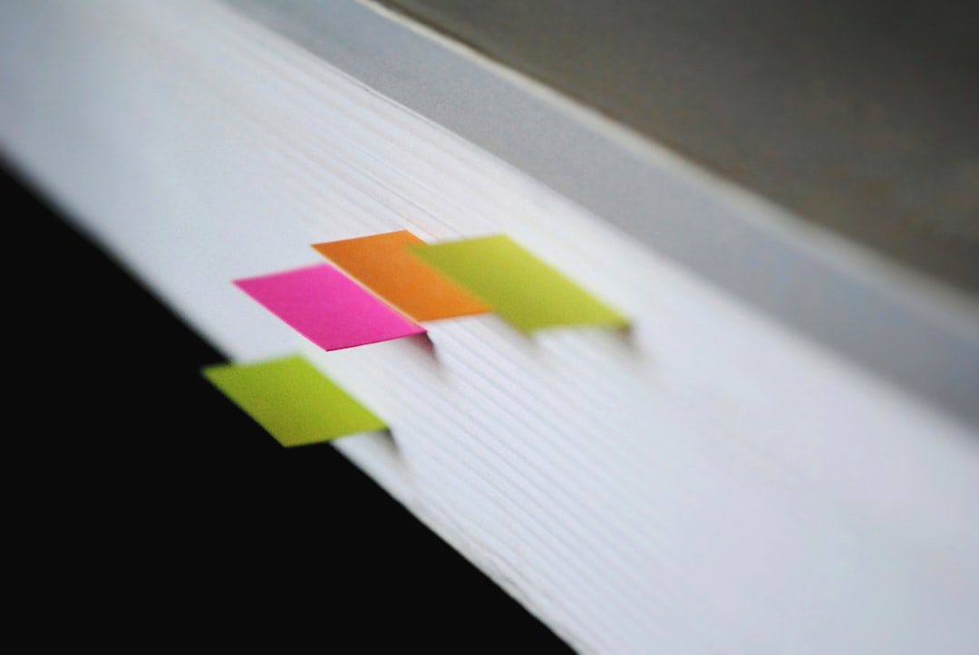 A bunch of colorful sticky notes on a board, kind of like how you'd compare different features or platforms when you're trying to decide.