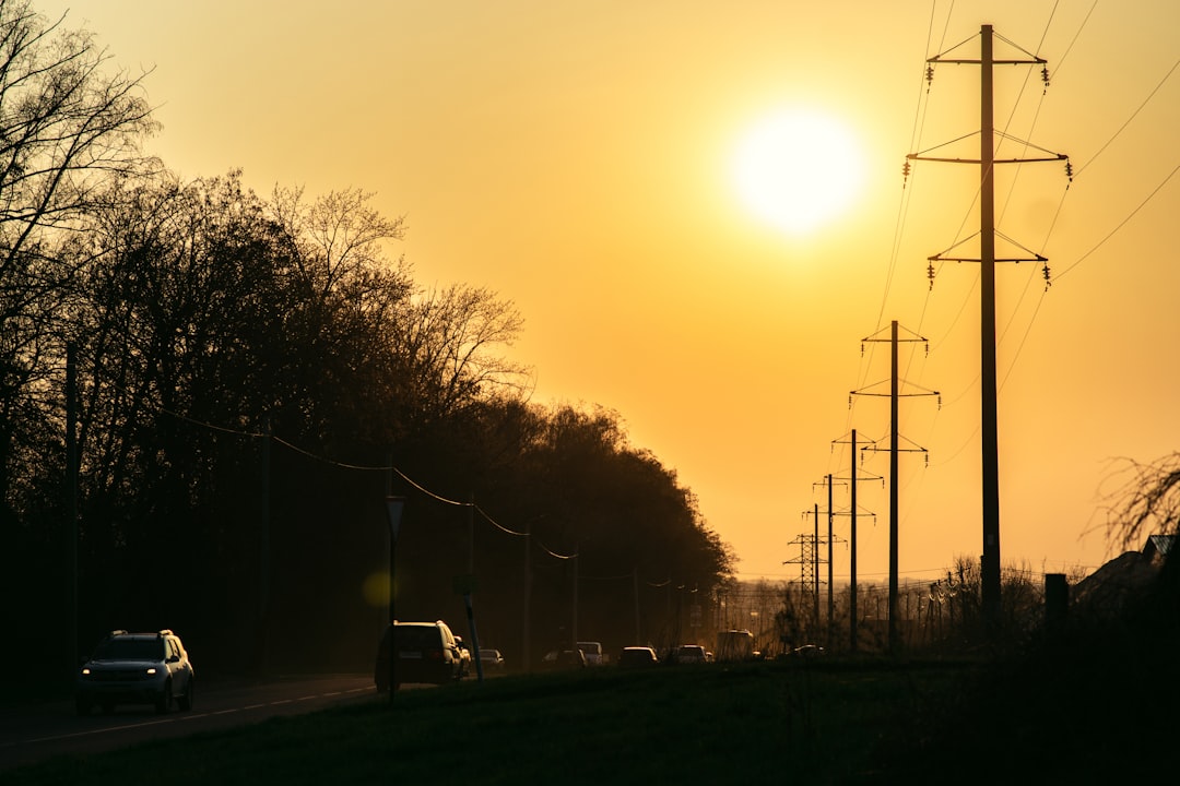 A clear, straight road heading into the horizon on a sunny day, symbolizing a straightforward path to growing a business.