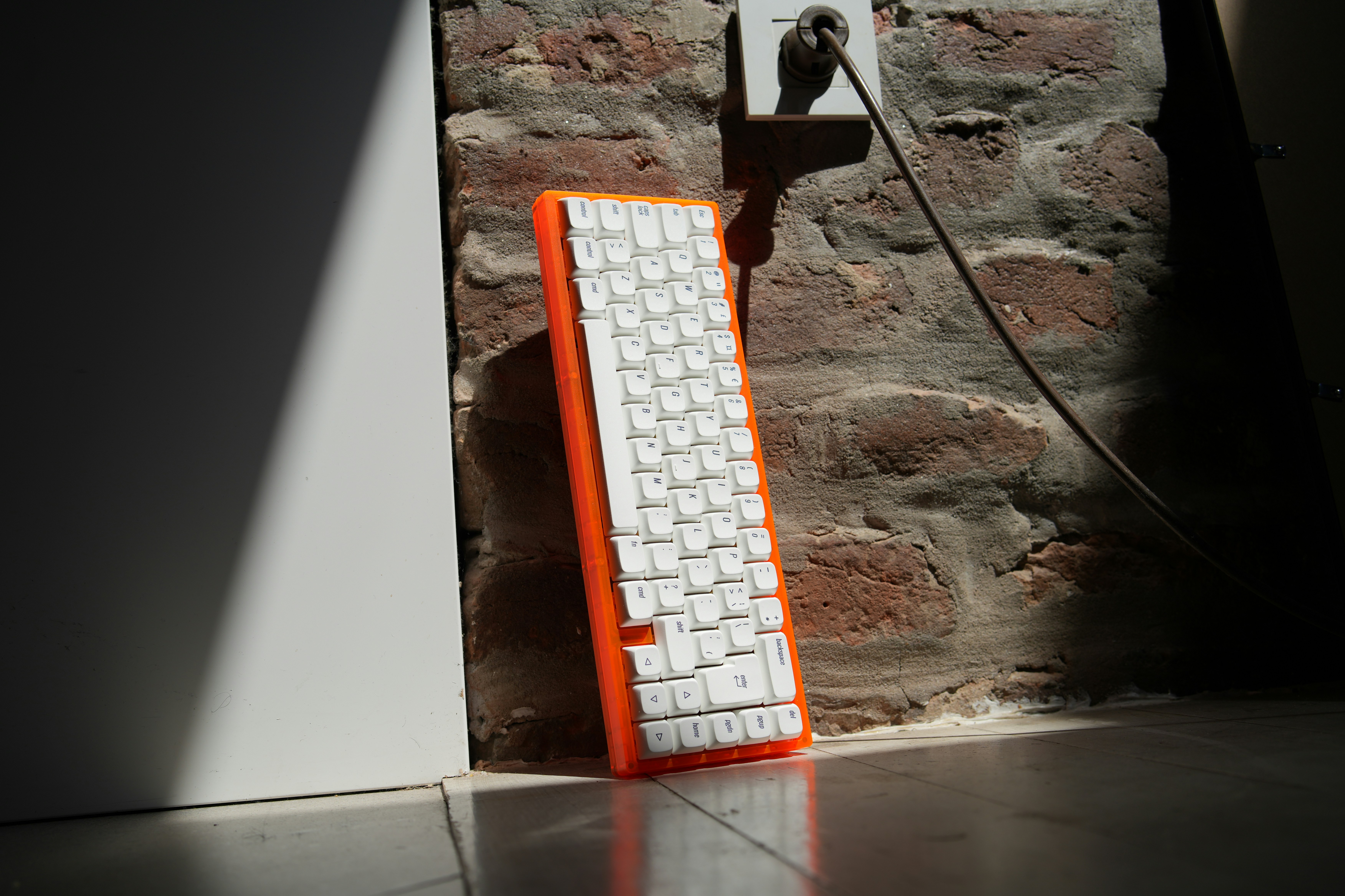 A close-up of a keyboard where one key glows brightly. It's labeled 'PUBLISH', symbolizing that awesome feeling of one-click publishing.