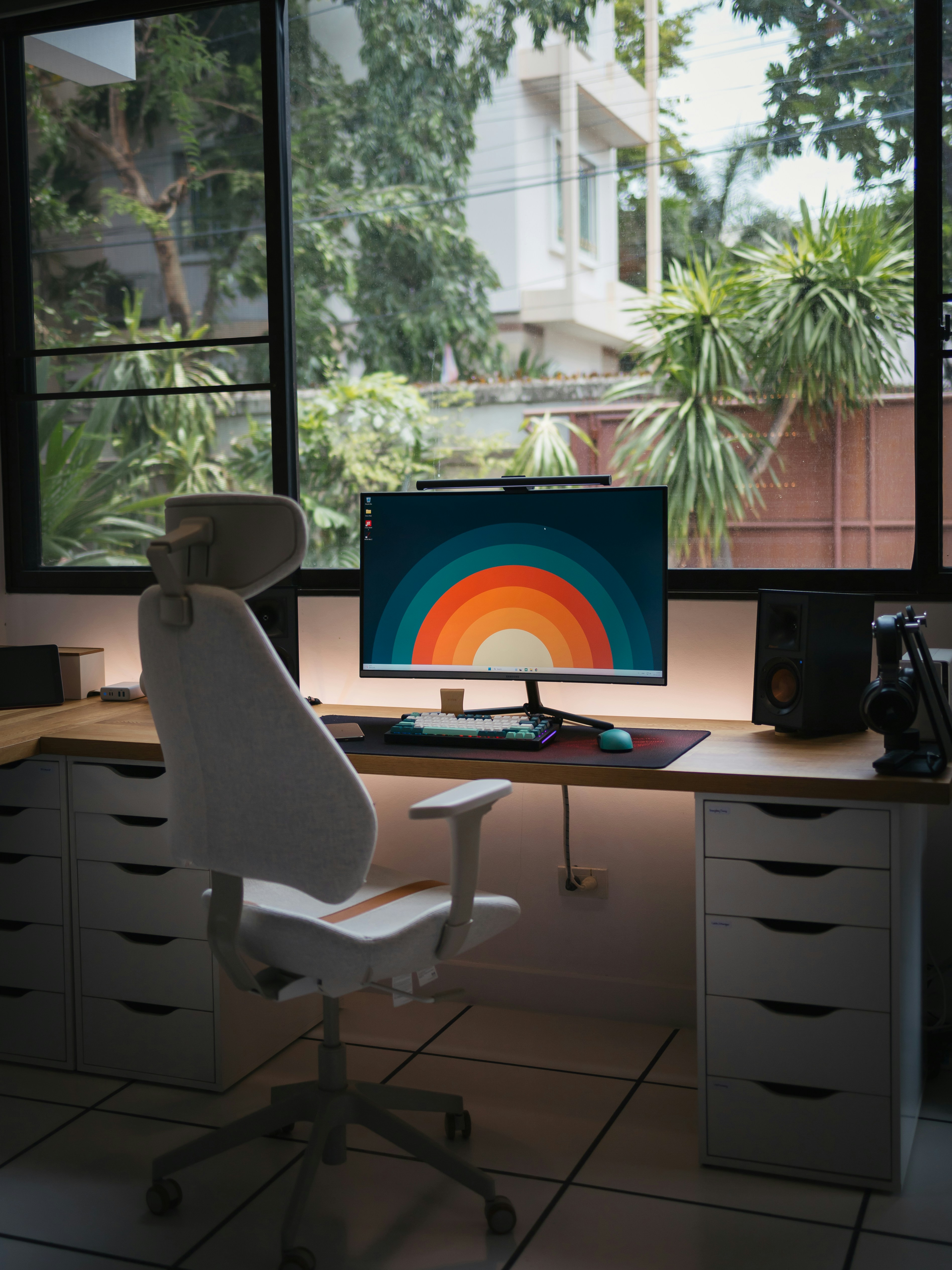 A wide shot of a modern, clean office with computers on desks, giving off a digital-first business vibe.
