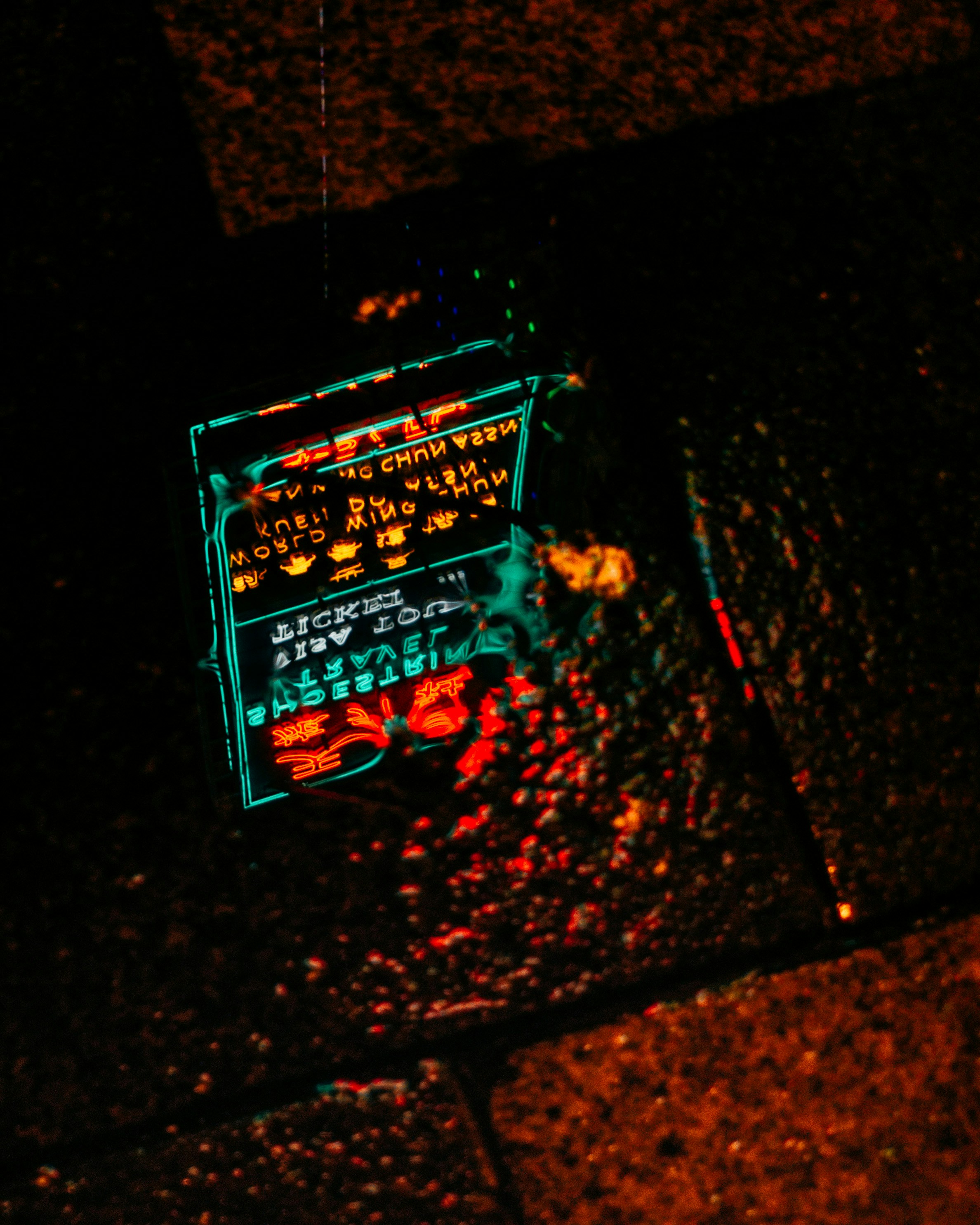 Close up of a QR code sticker on a guitar case with blurred city street background