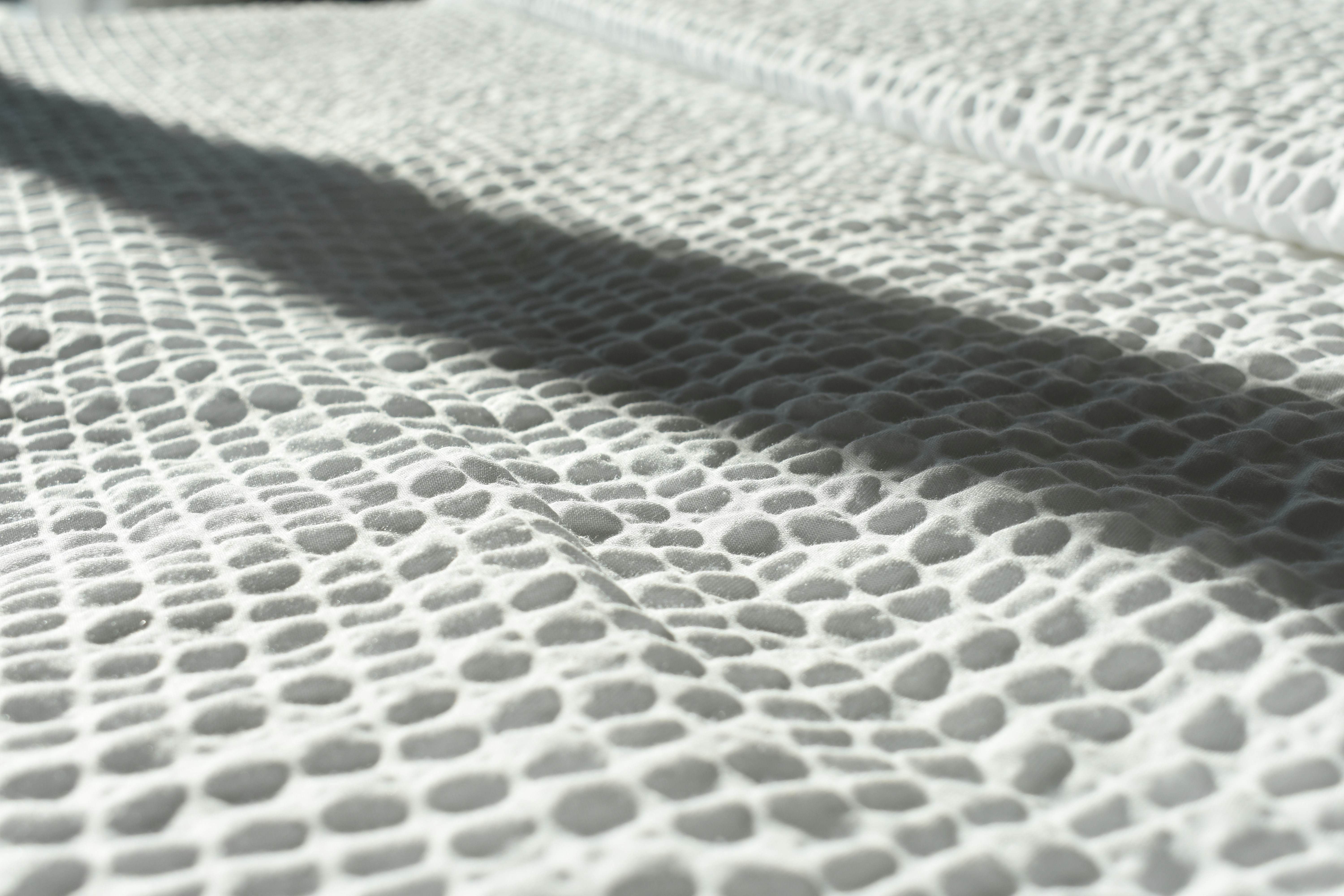 Close up texture of a fabric panel blind showing high quality weave