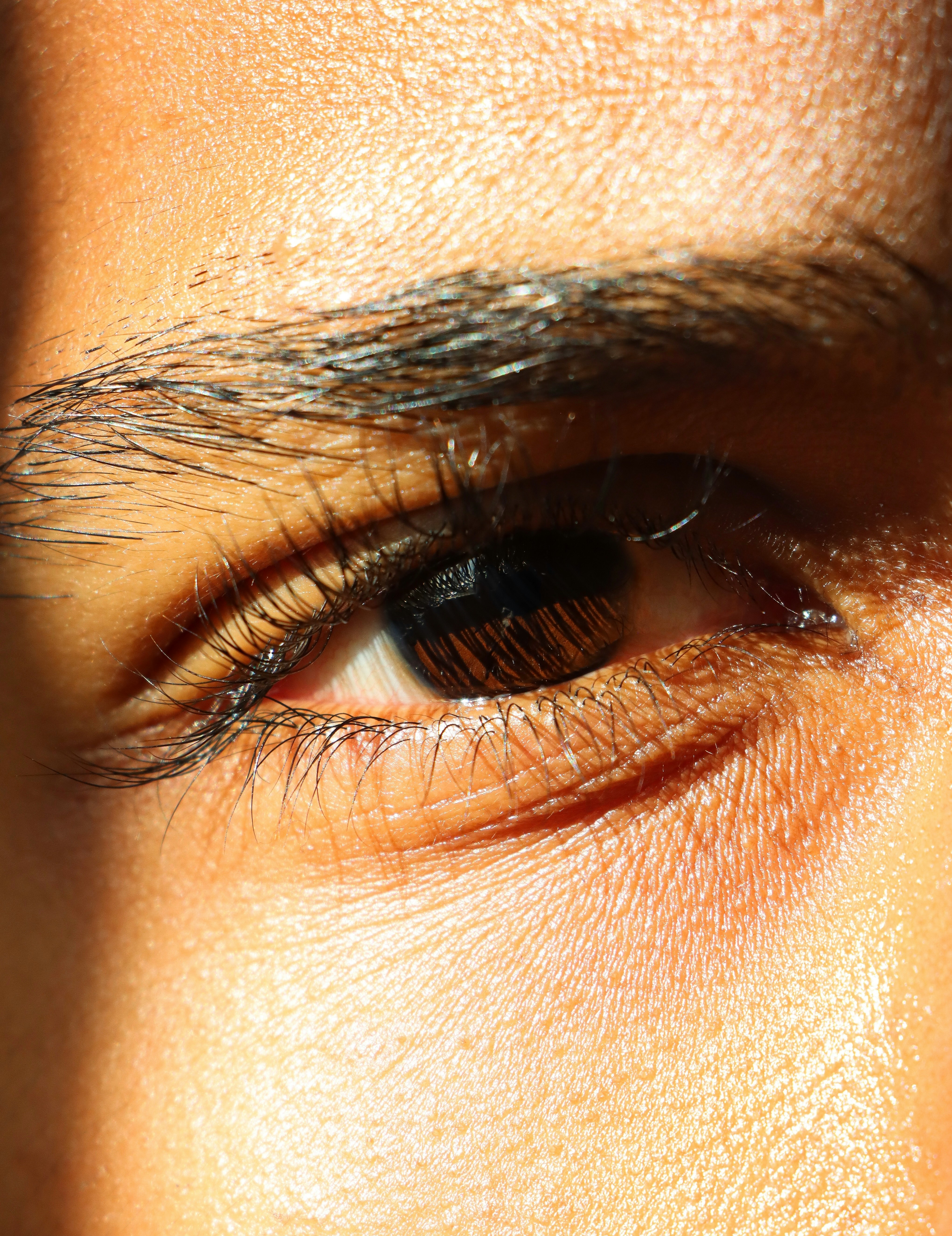 Close up photo of an eye focusing, representing the eye movement therapy concept, blurry background