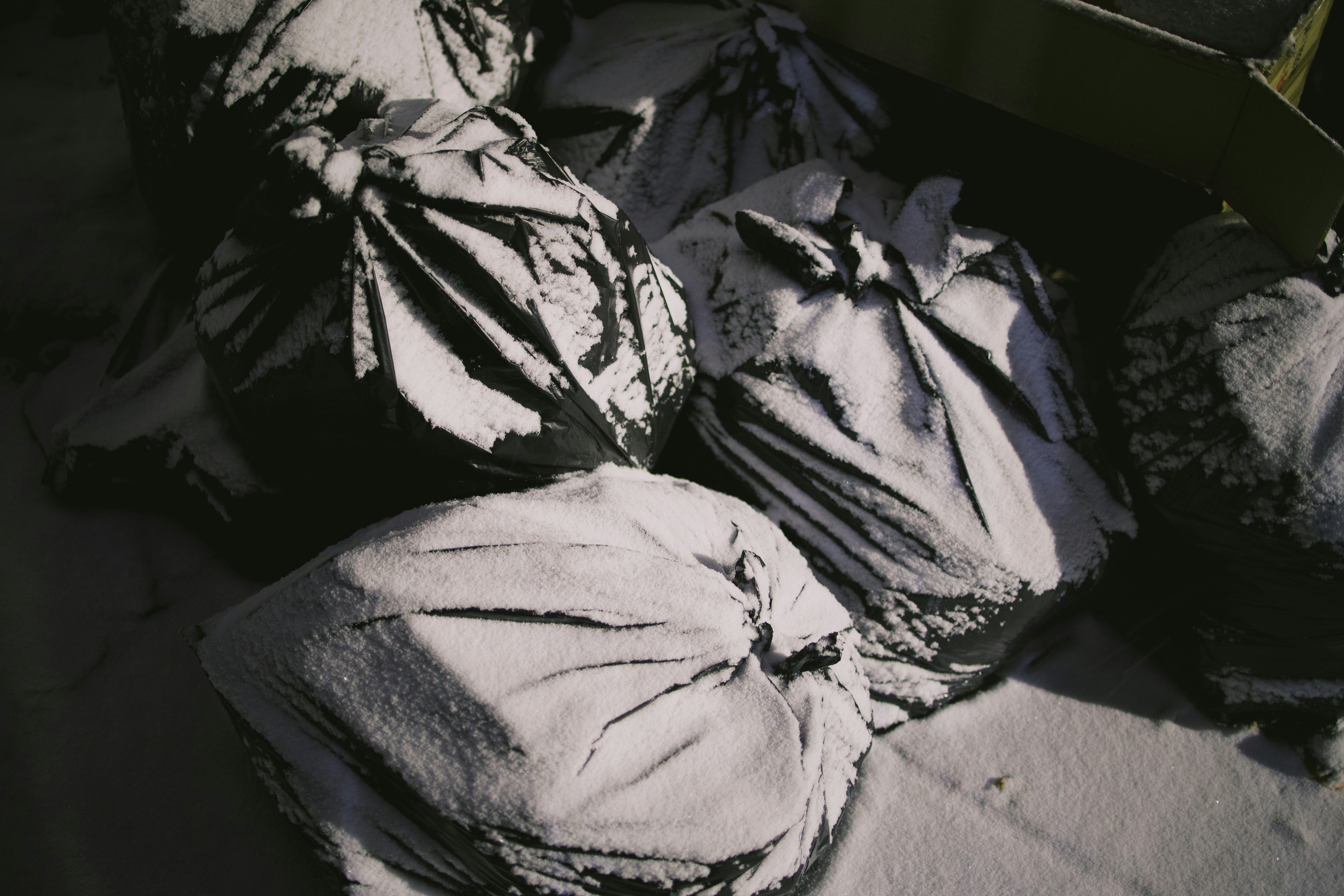 Unsplash image of piles of folded clothes ready for shipping in a warehouse