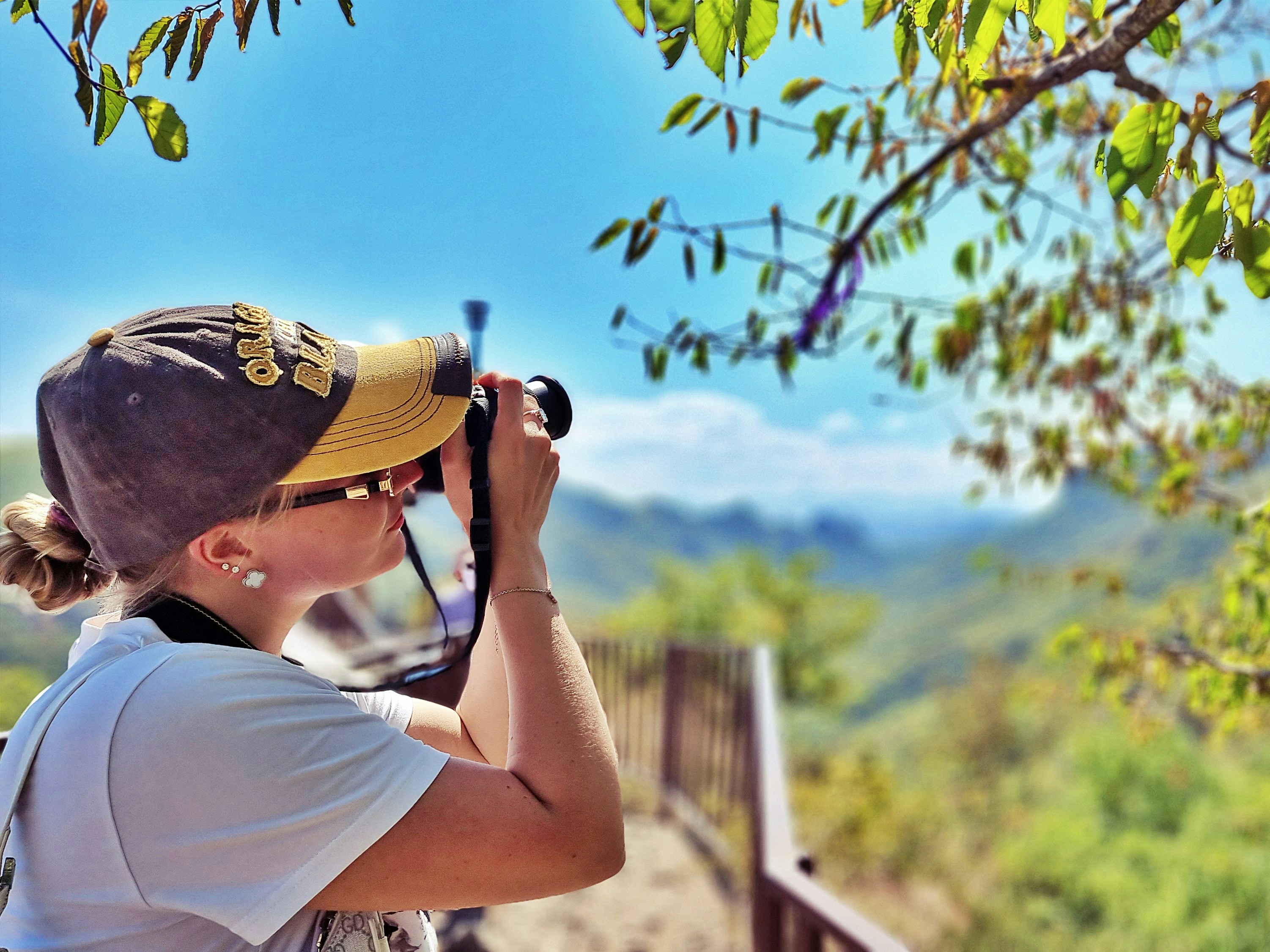 A hiker looking at a view, representing the lifestyle content e-commerce brands should create to attract their target audience.