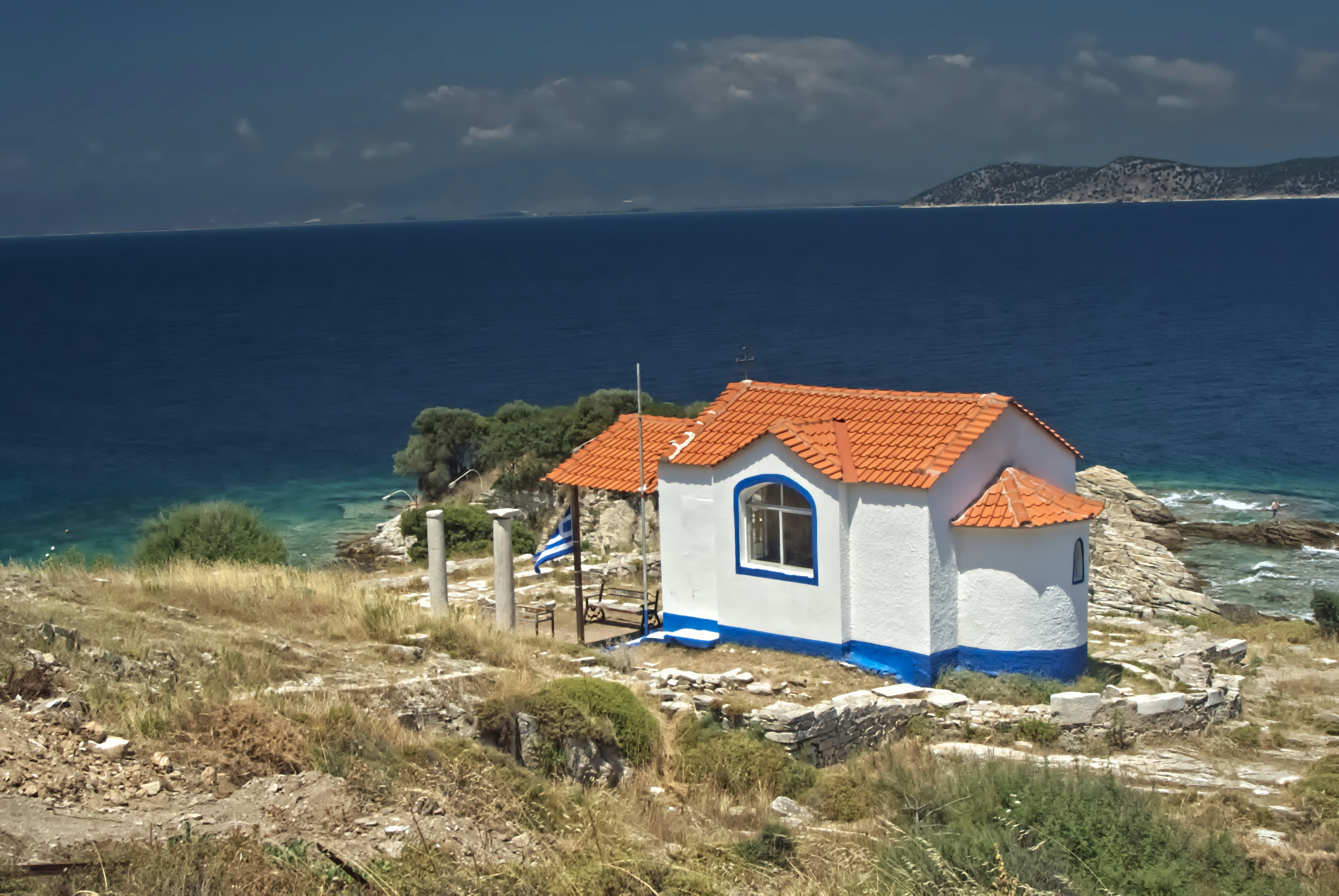 Hands carefully placing a small bowl of coarse sea salt near a wooden door frame for protection.