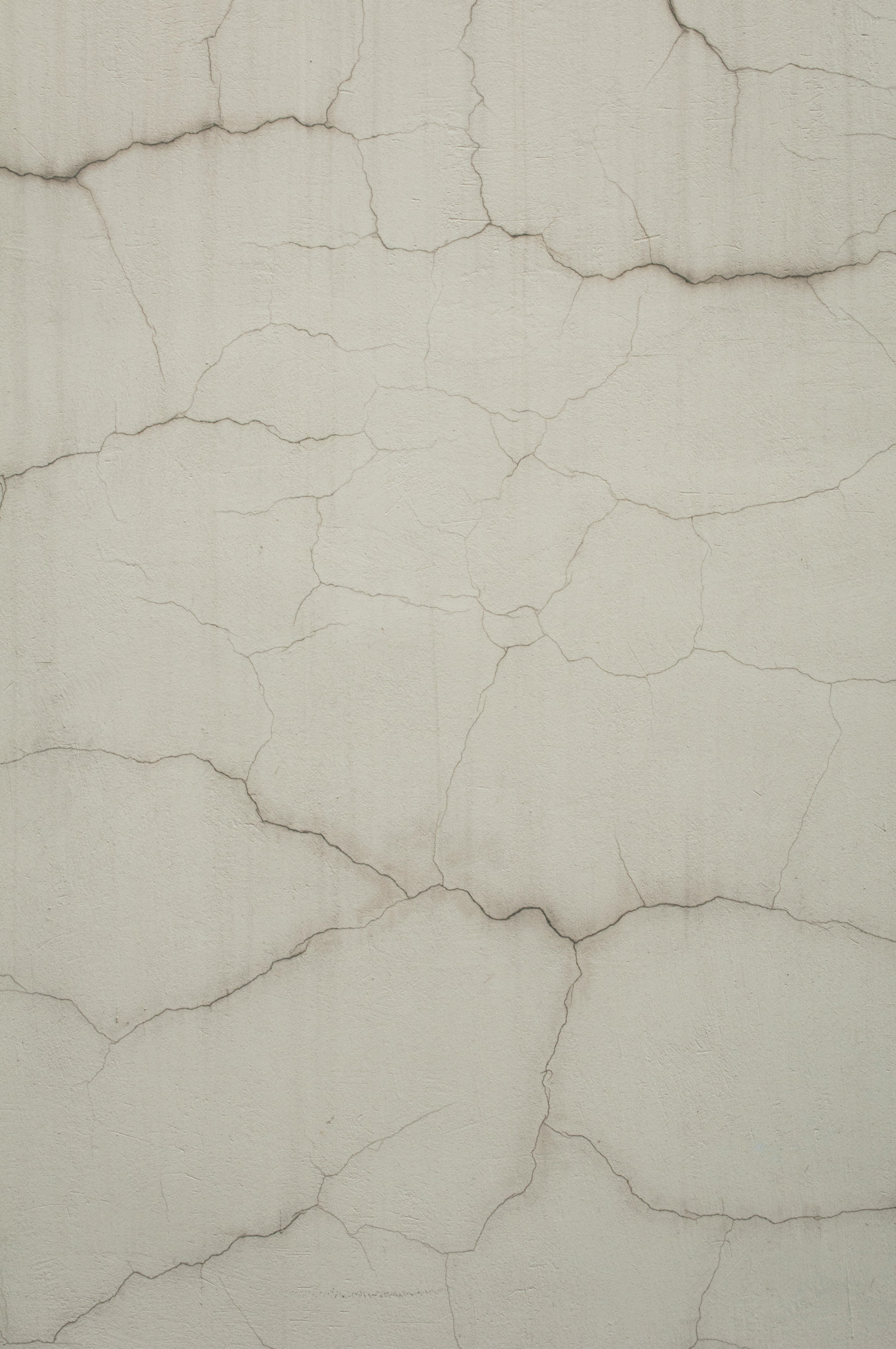 Close up detail shot of different texture materials together: rough wood, soft velvet fabric, and smooth marble surface