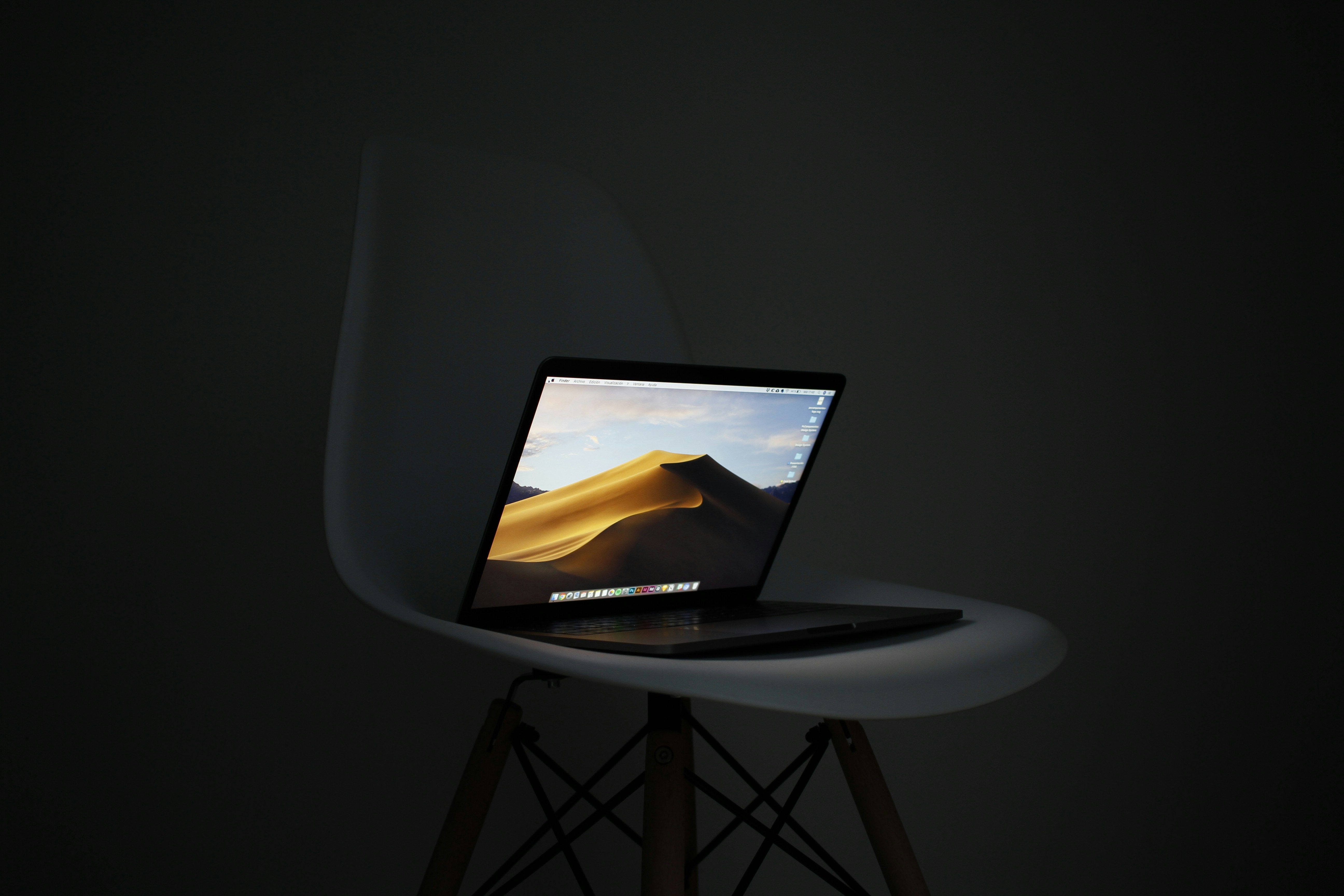 Close up creative shot of a minimalist workspace with a laptop showing SEO analytics