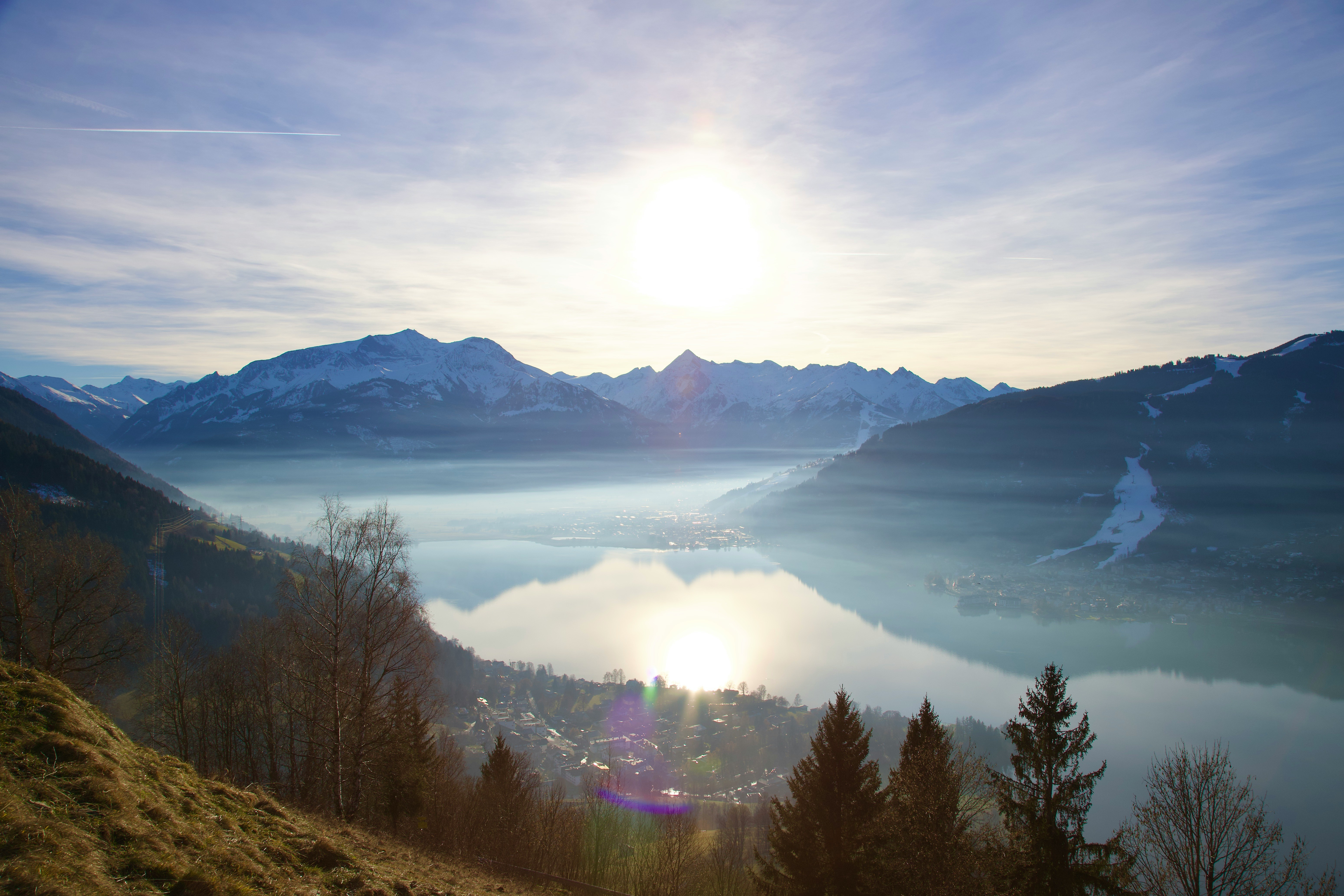 A swiss landscape with mountains reflecting in a lake giving a sense of clarity and perspective
