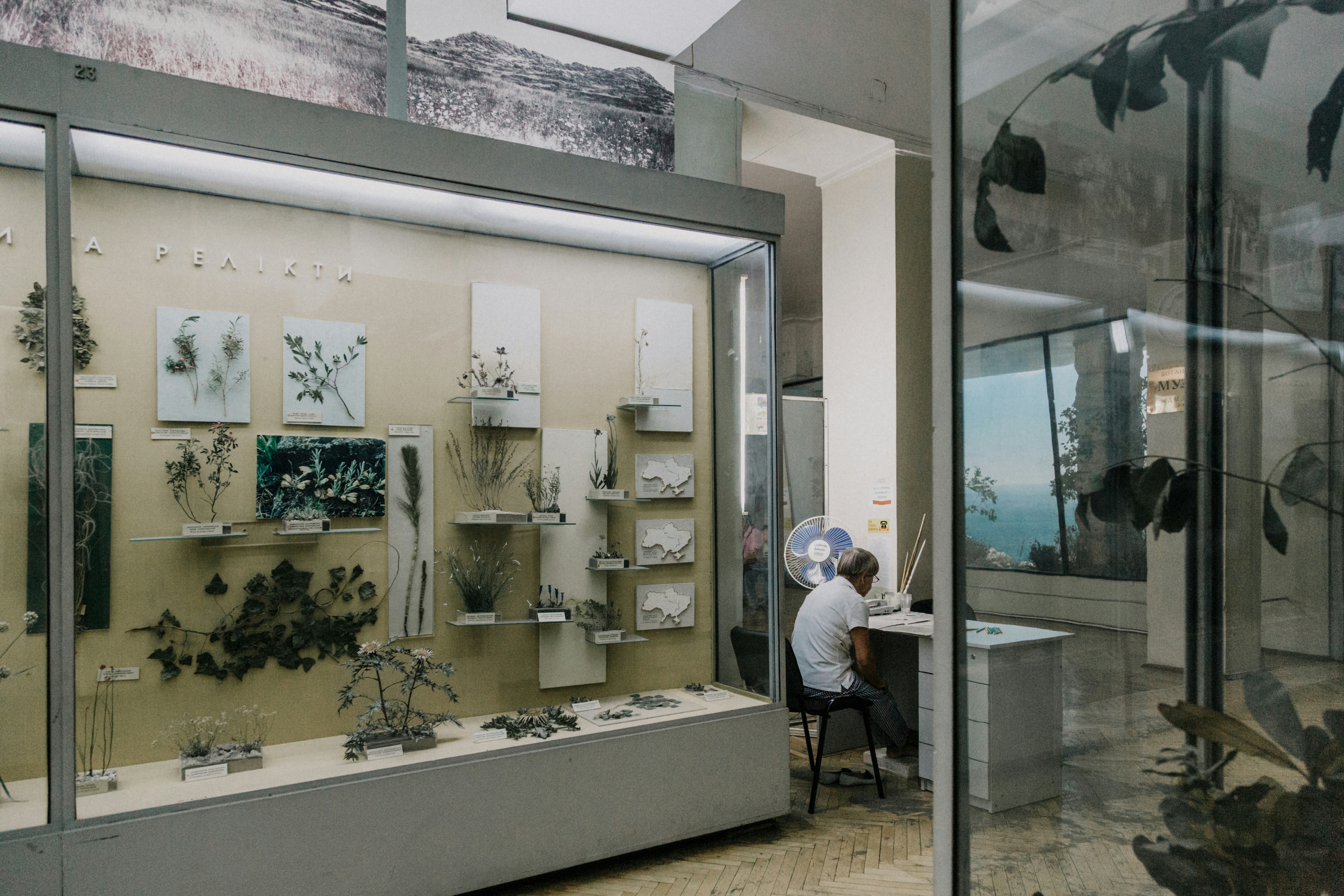 Architect reviewing marble samples with client in a showroom setting