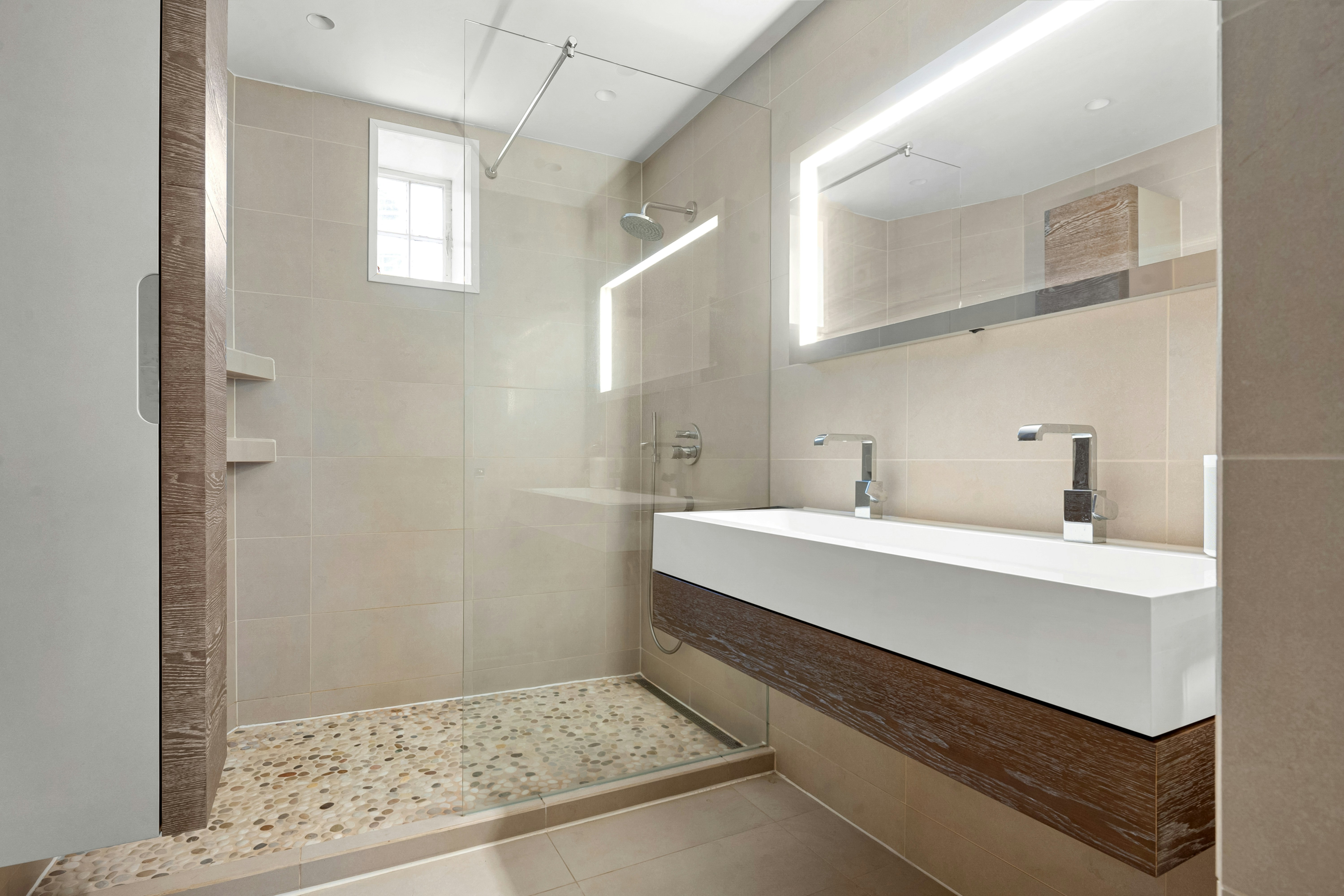 Modern clean tiled bathroom in a commercial space, high quality finish