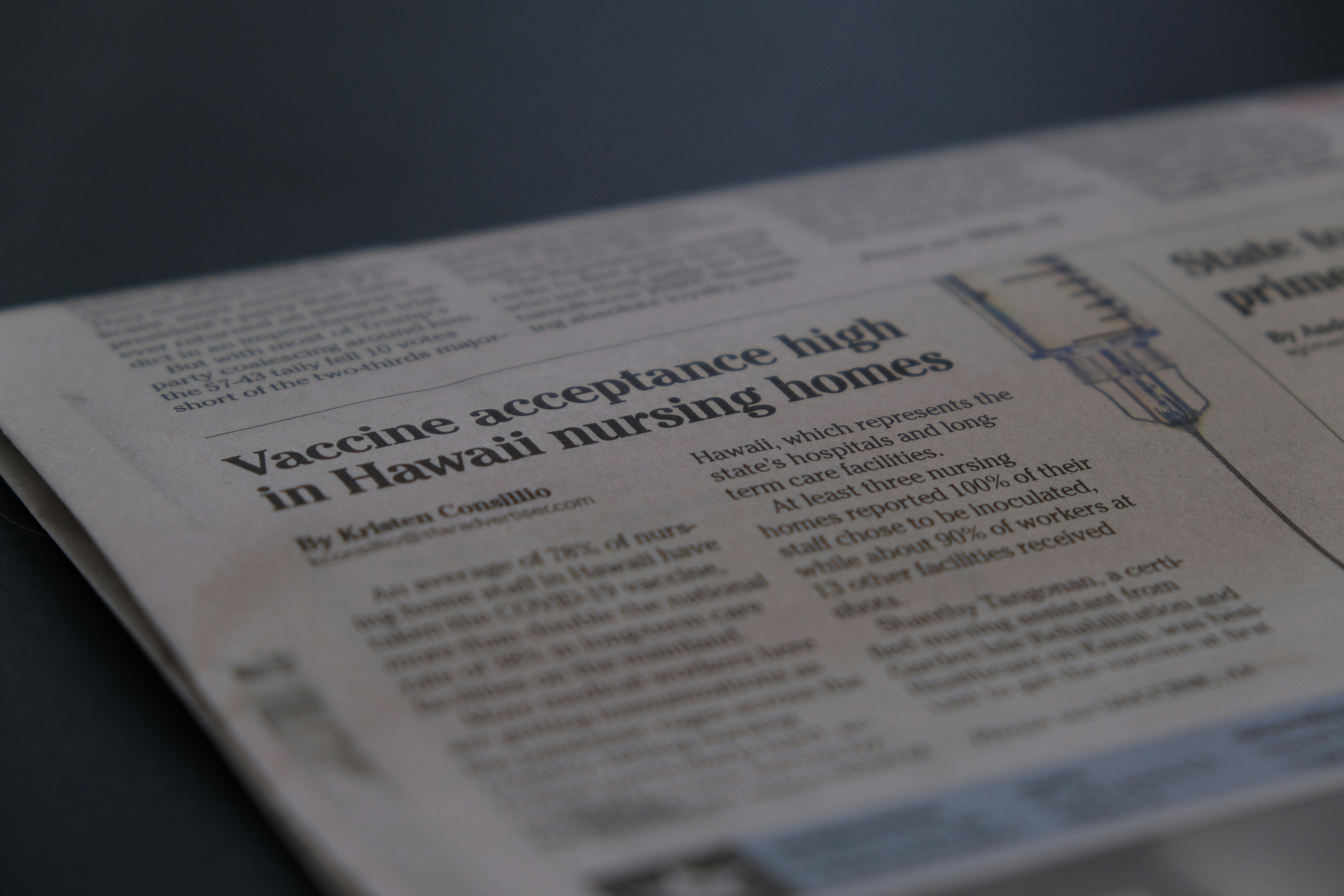 Close up of a computer screen showing AI text generation cursor writing a headline