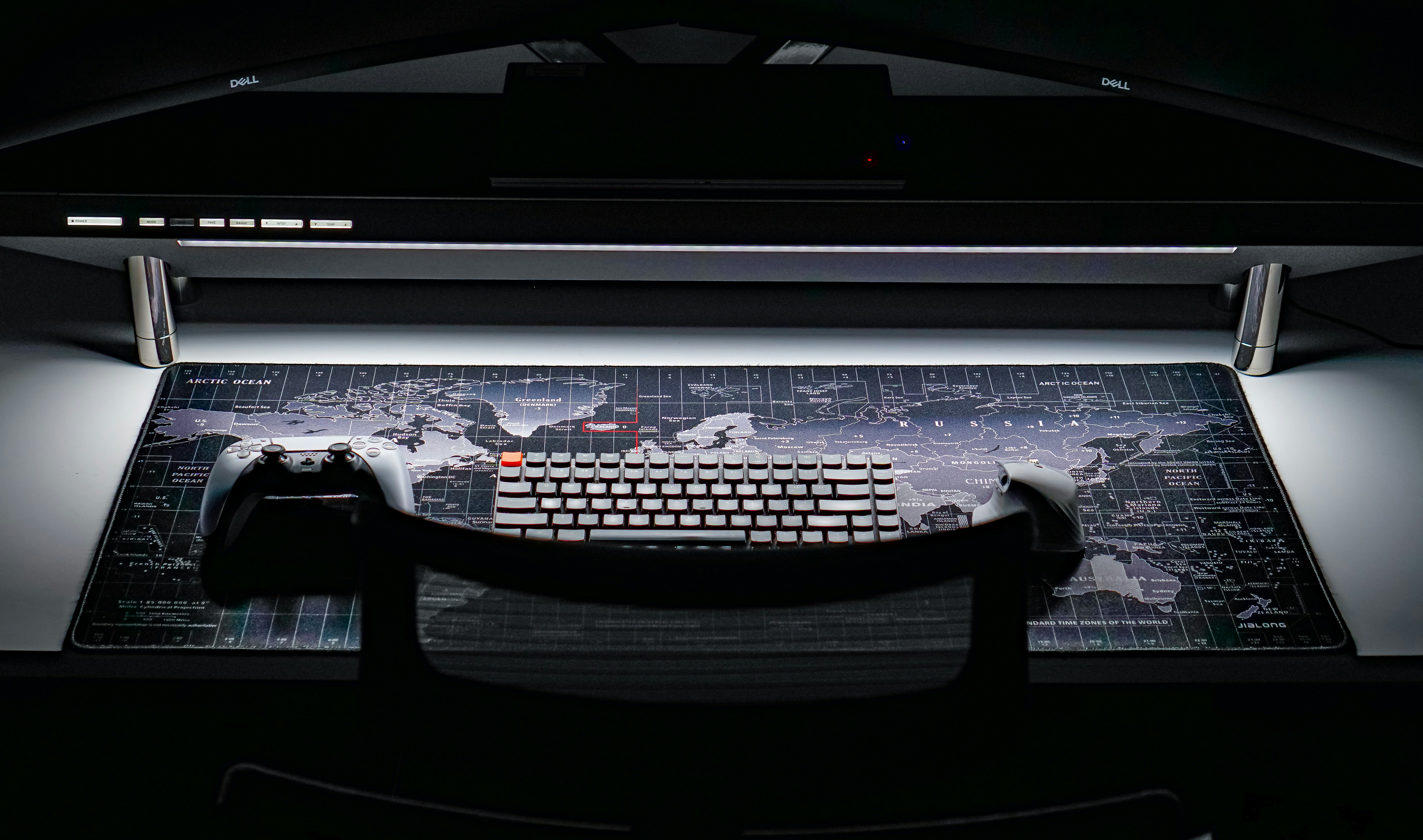 Photographer looking at sales dashboard on a laptop with coffee nearby