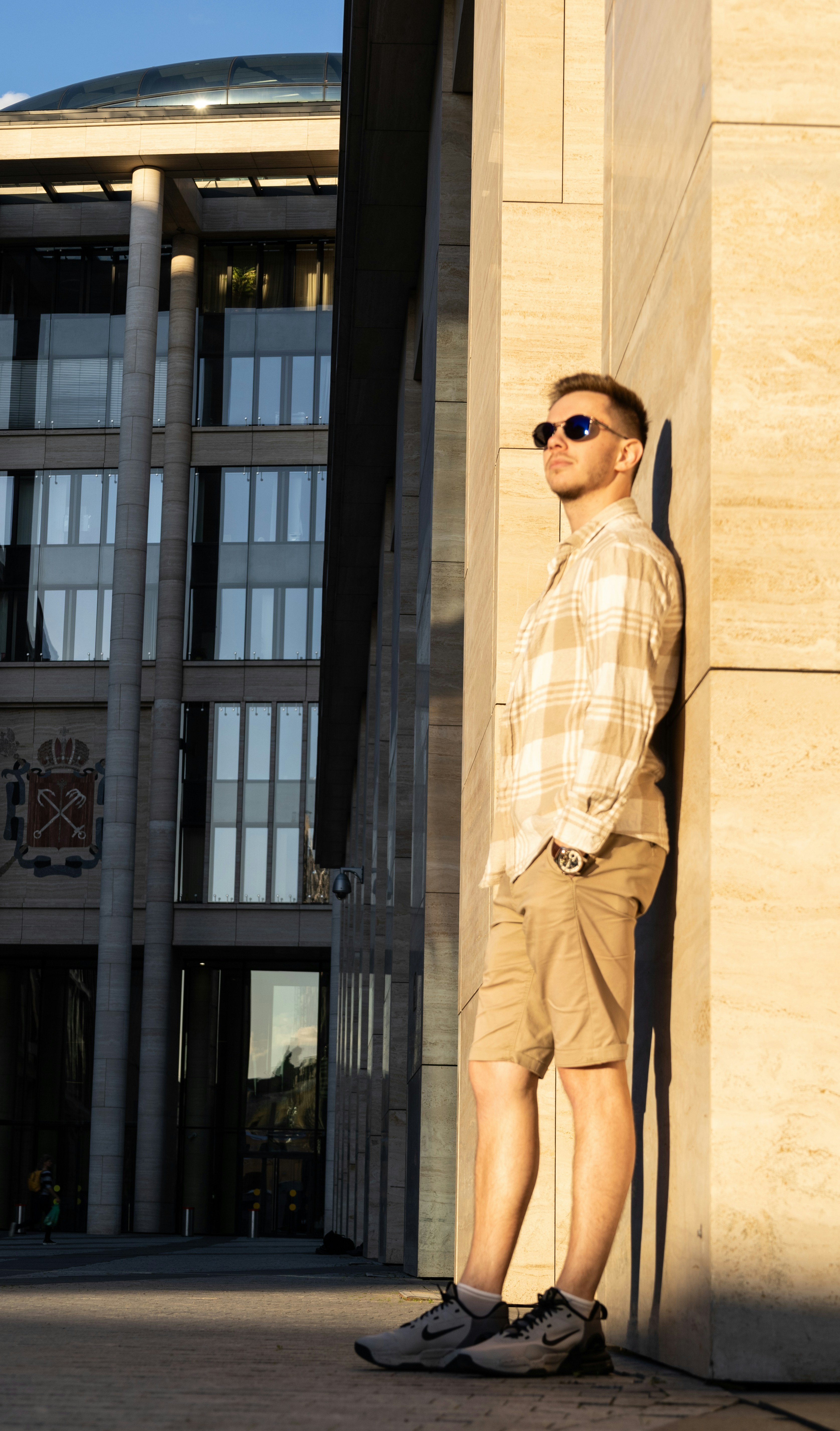 Close up portrait of a confident man with blurred background outdoors