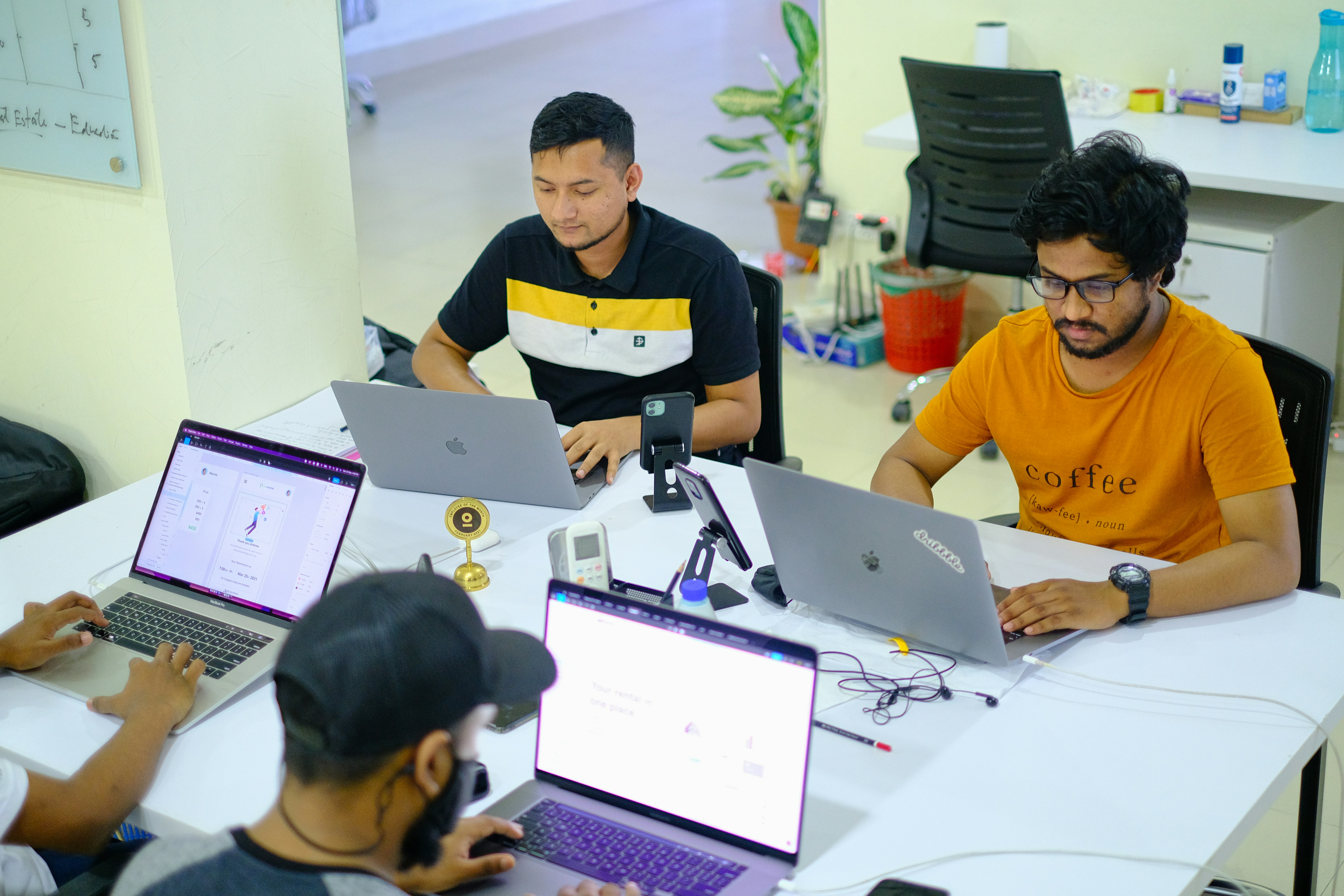 Team of developers working together on a code project using ai tools