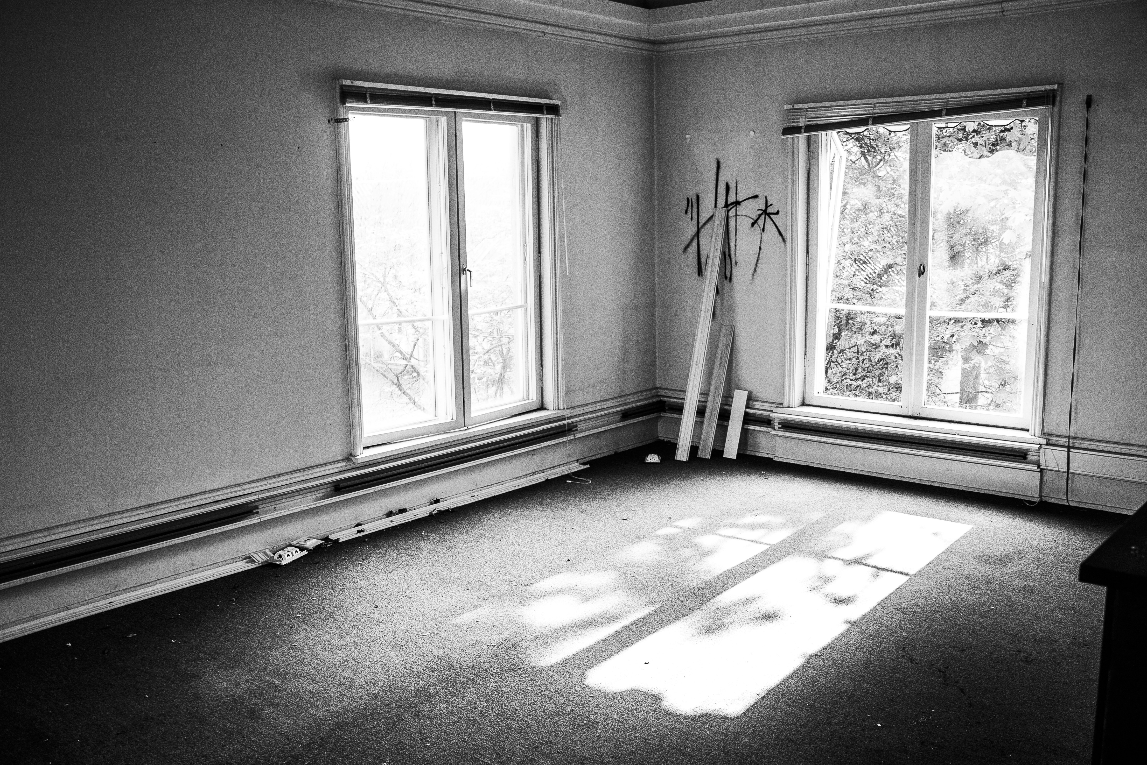 clean bright empty room with renovation tools ready on the floor