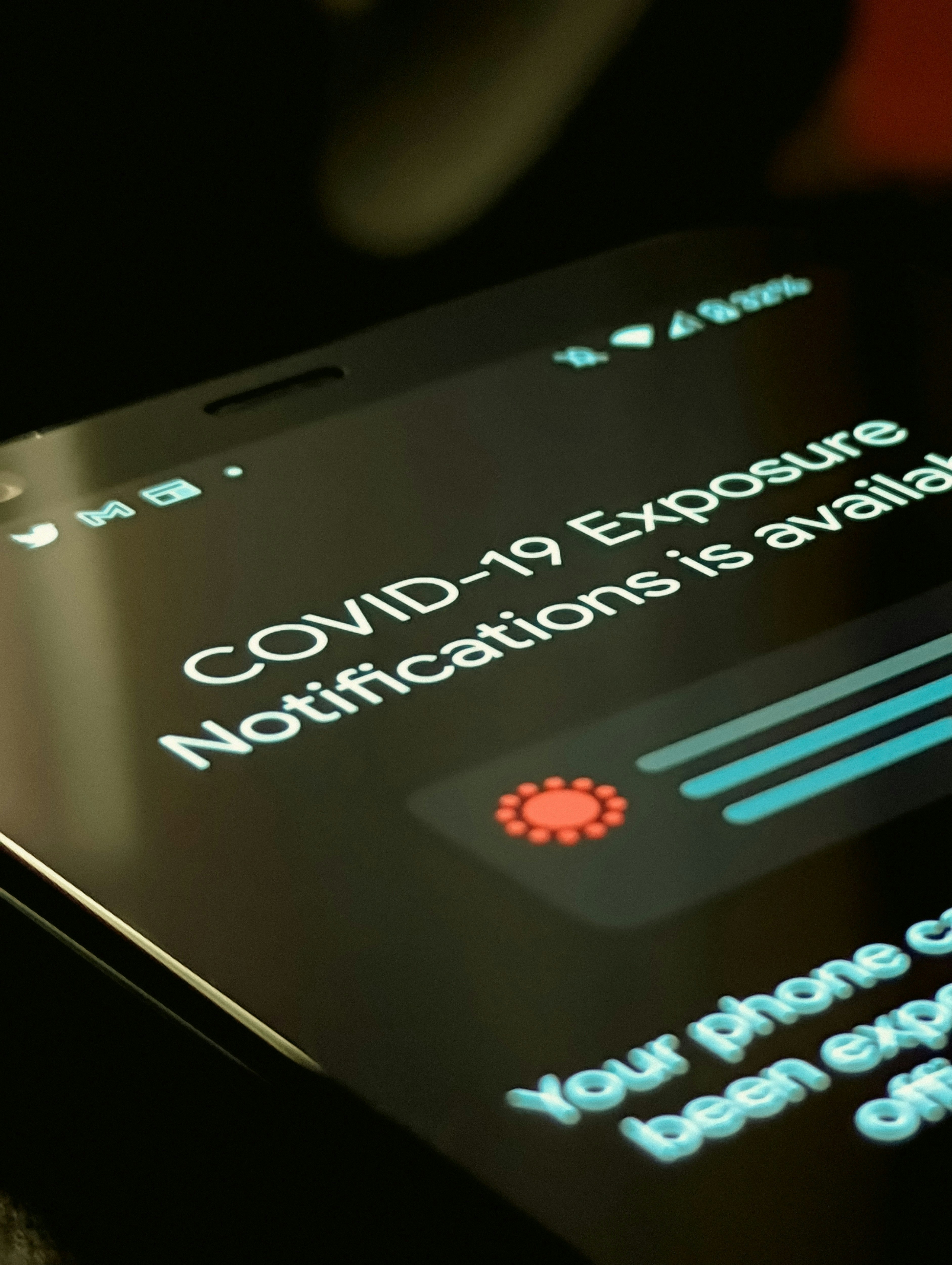 Close up of a smartphone screen scanning a QR code, displaying a notification to open a link
