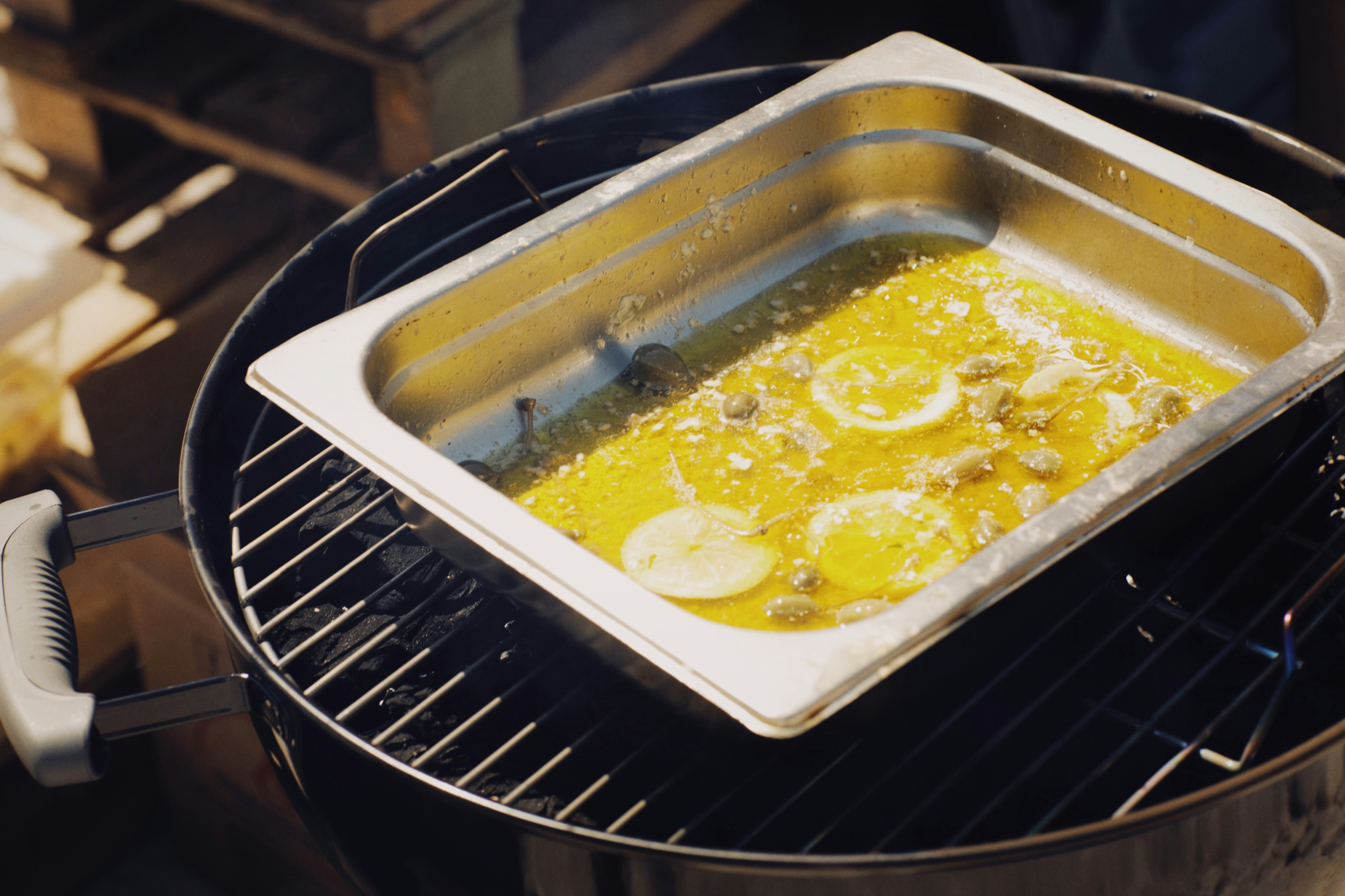 Fresh cod fillet topped with creamy mustard sauce straight out of the oven in a ceramic dish