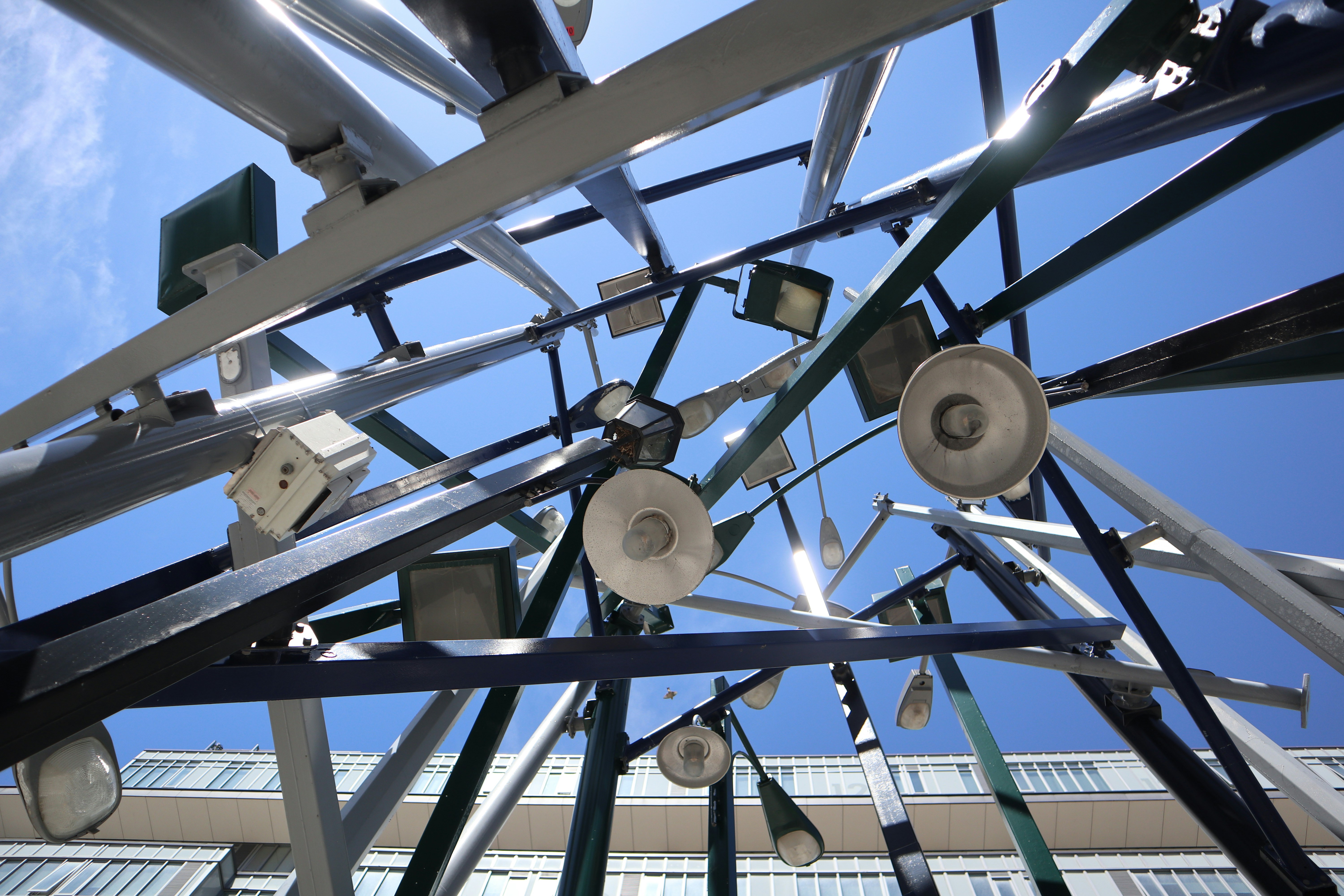 Abstract concept of data flowing through digital automated gears on a dark background