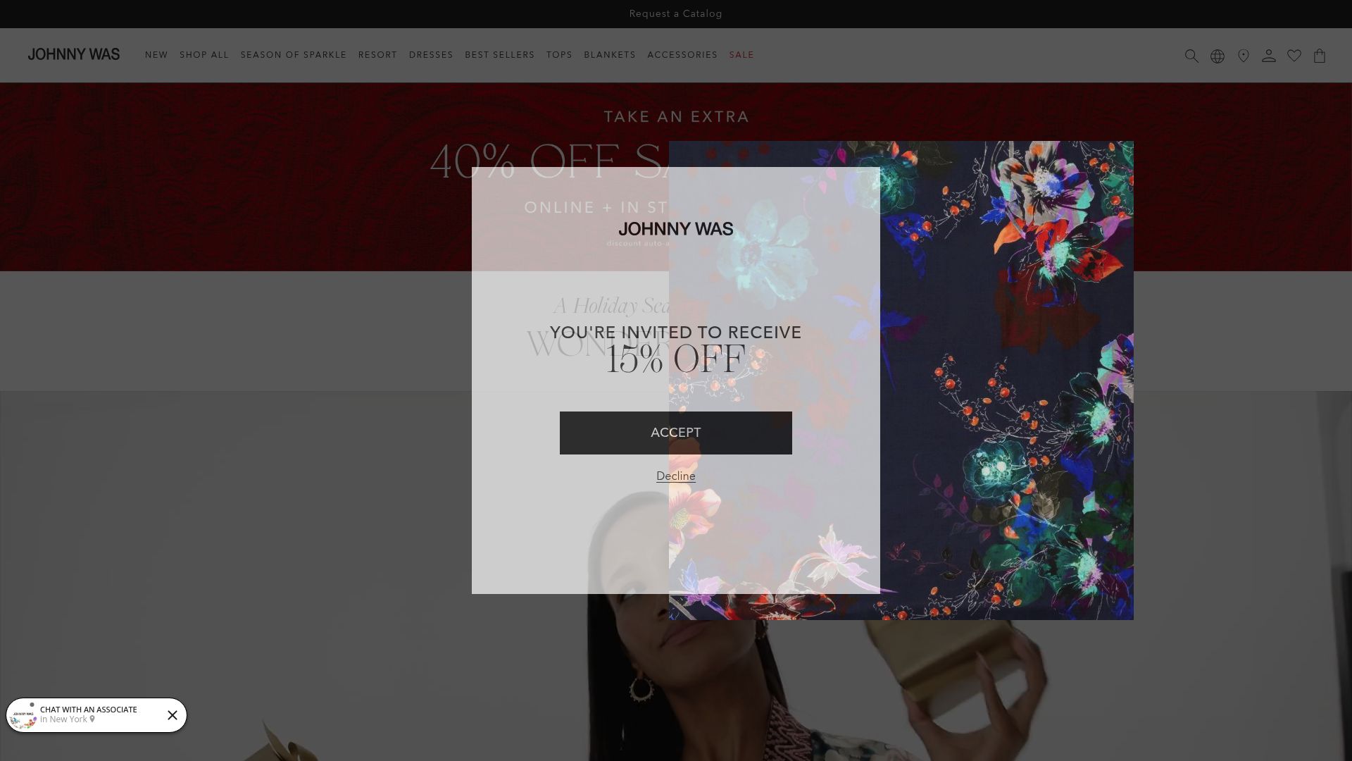 Homepage of Johnny Was website showing embroidered velvet jackets and boho dresses