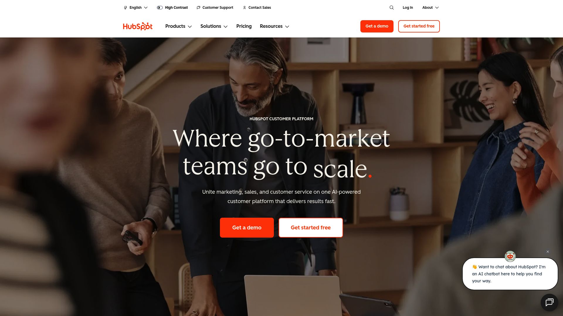 Screenshot of HubSpot homepage showing the CRM dashboard and marketing hub features