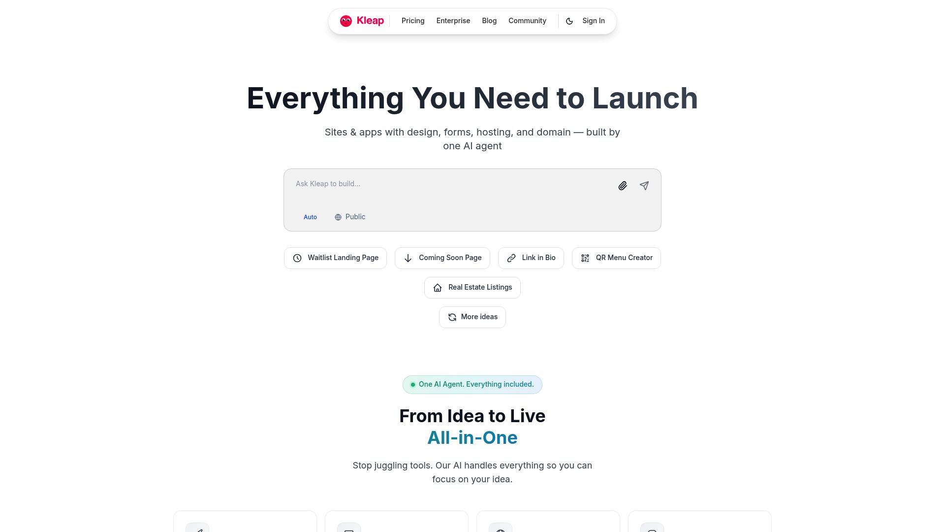 Close up of a smartphone displaying a Kleap website builder interface with chat-based prompts