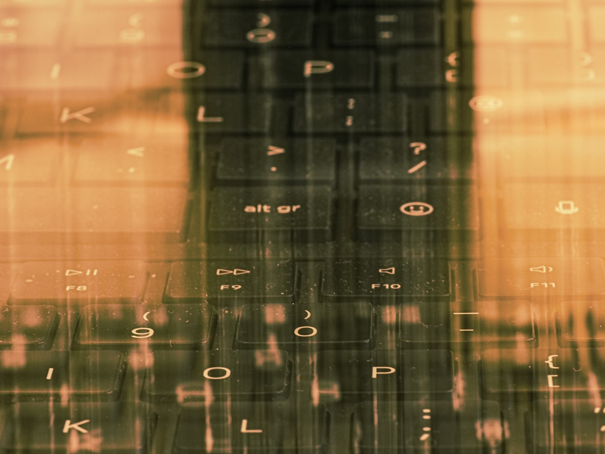 A close up of a window with a building in the background