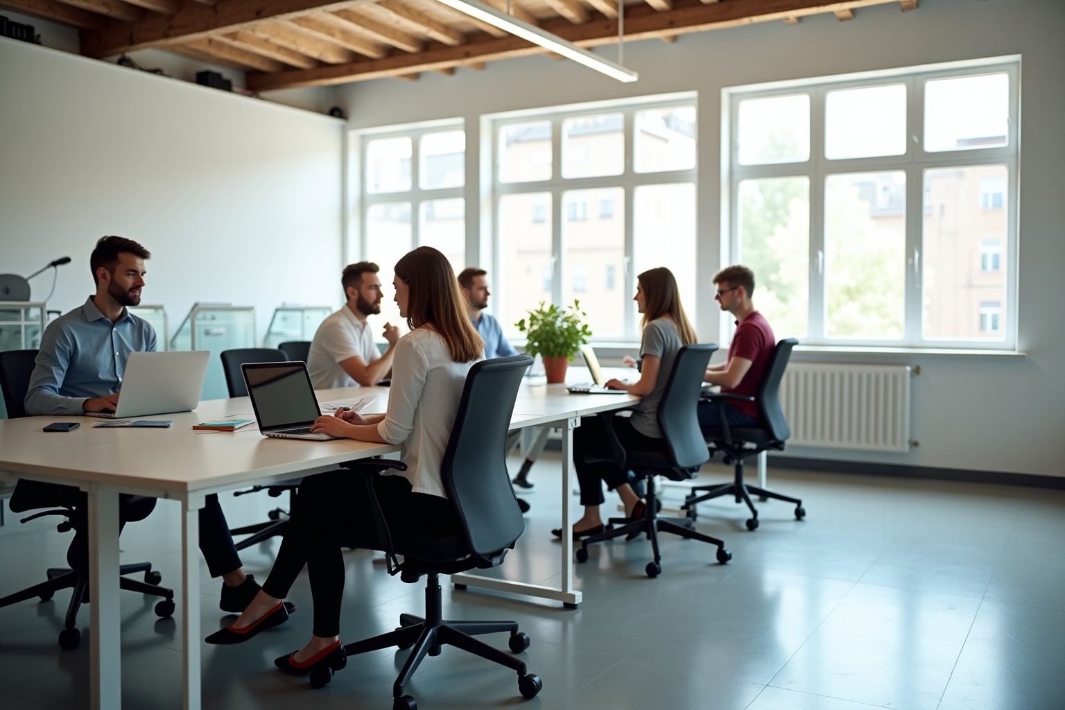 A group of people working together in a modern office space.
