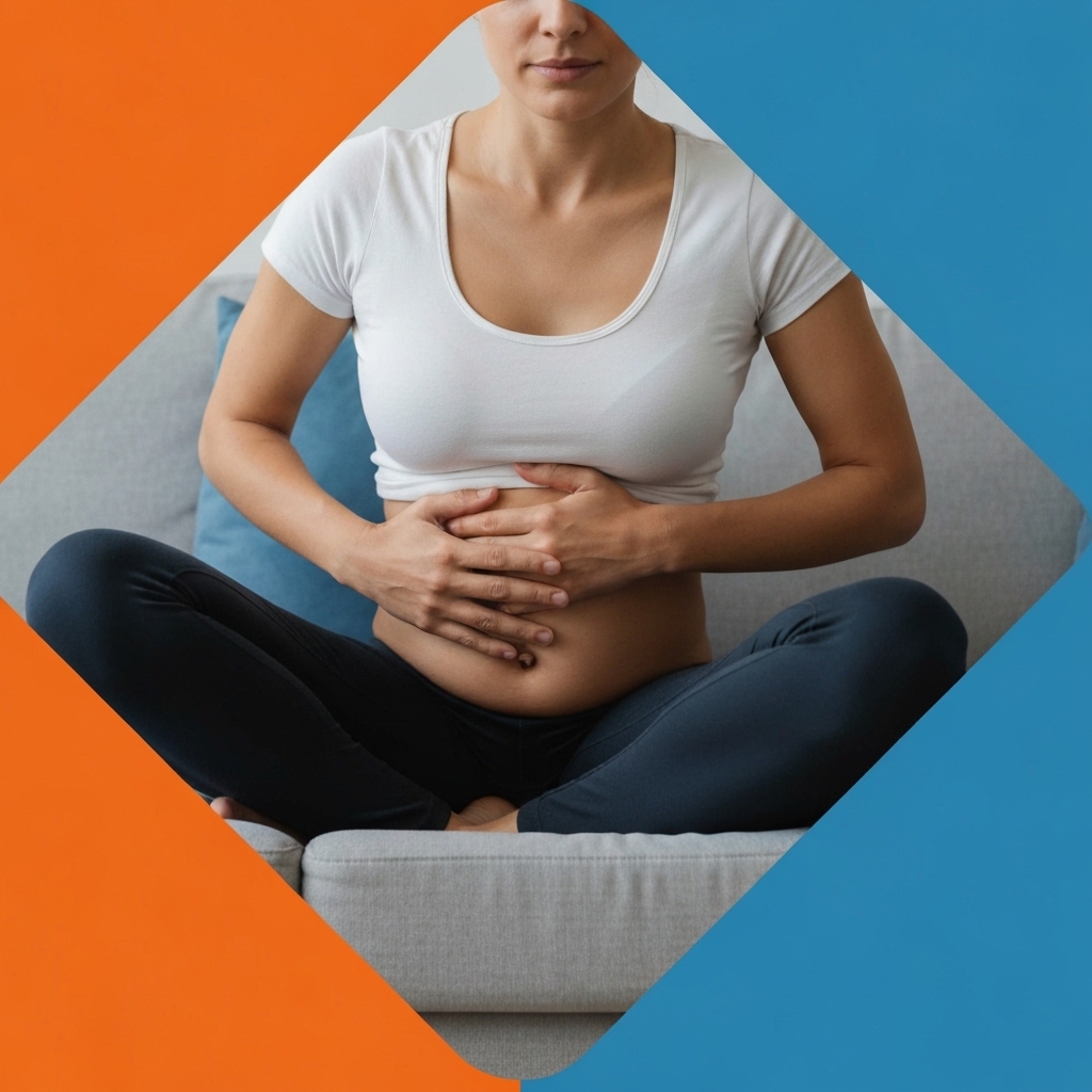 Person sitting on couch holding their stomach area with both hands, facial expression showing discomfort, home interior setting with natural lighting