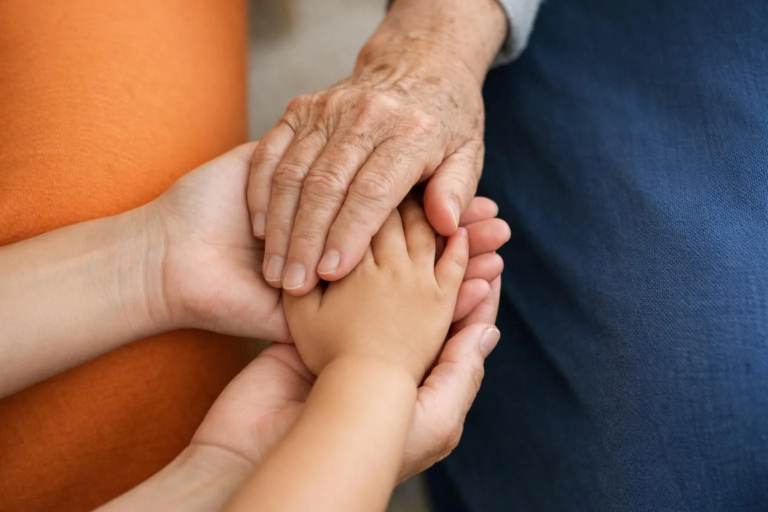 Photorealistic scene showing three generations of hands gently holding each other in a vertical composition, representing biological and emotional connection through time, soft natural lighting, warm skin tones, symbolic of memory and care transmission across family lineage