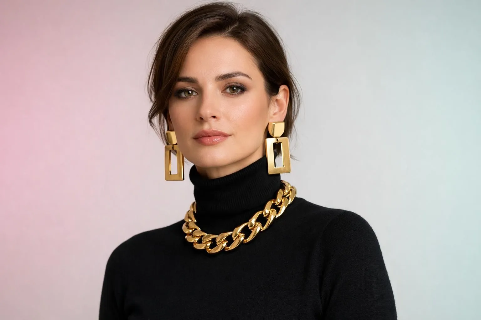 Elegant Parisian woman in minimalist black turtleneck wearing bold chunky gold statement necklace and oversized geometric gold earrings, studio lighting against neutral background, luxury jewelry editorial style