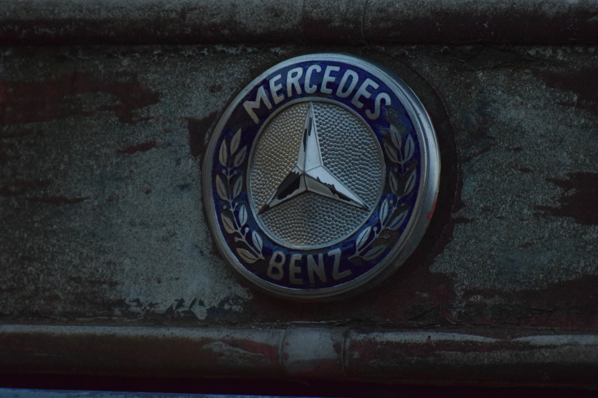 a mercedes emblem on the side of a building