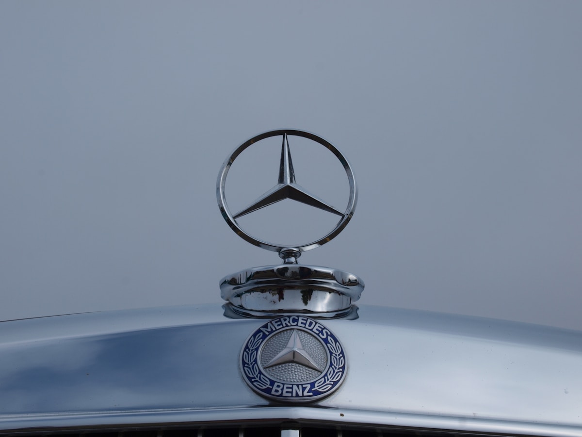 Chrome mercedes-benz hood ornament and emblem